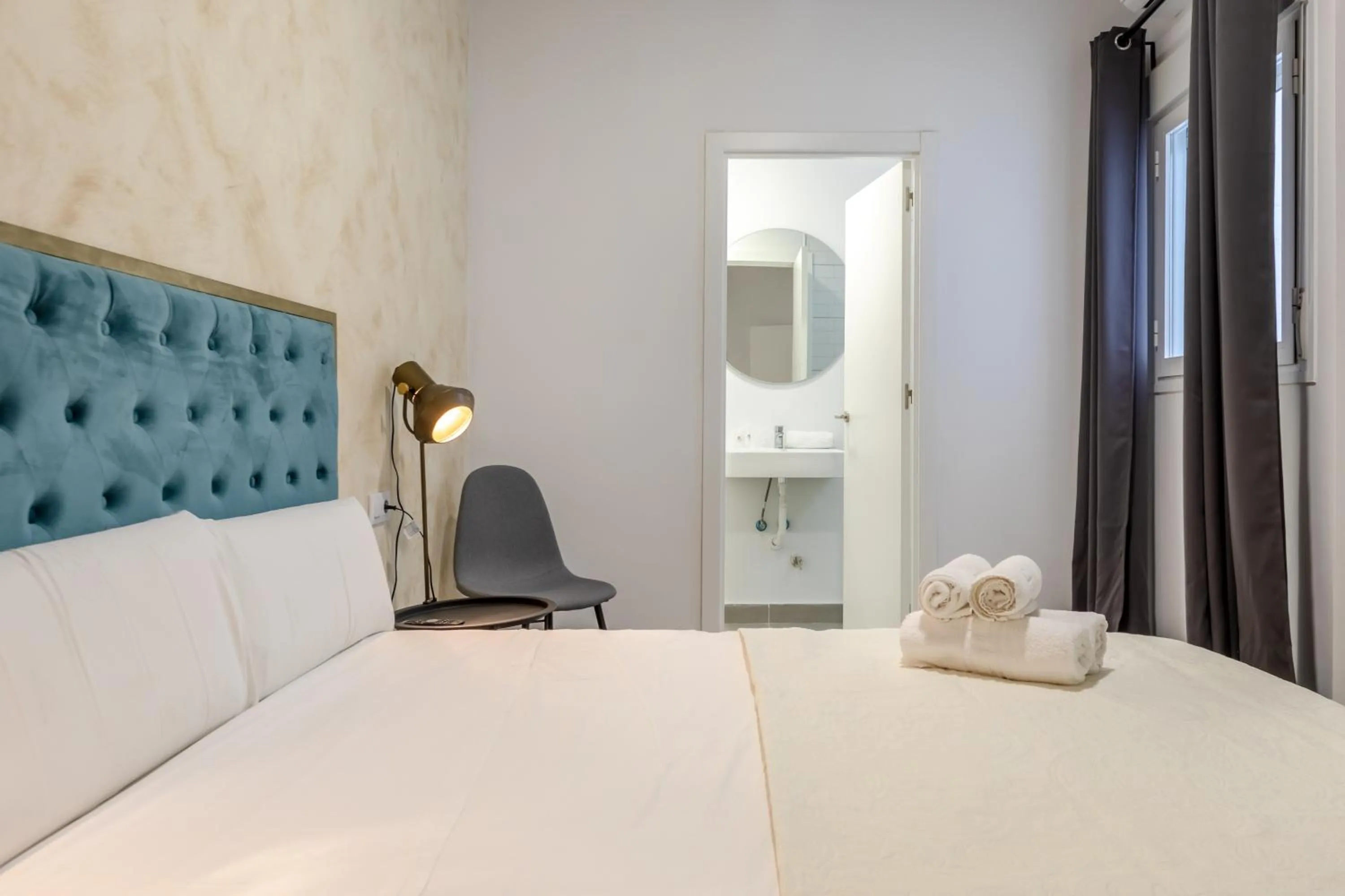 Bed in Villamarta Boutique Rooms