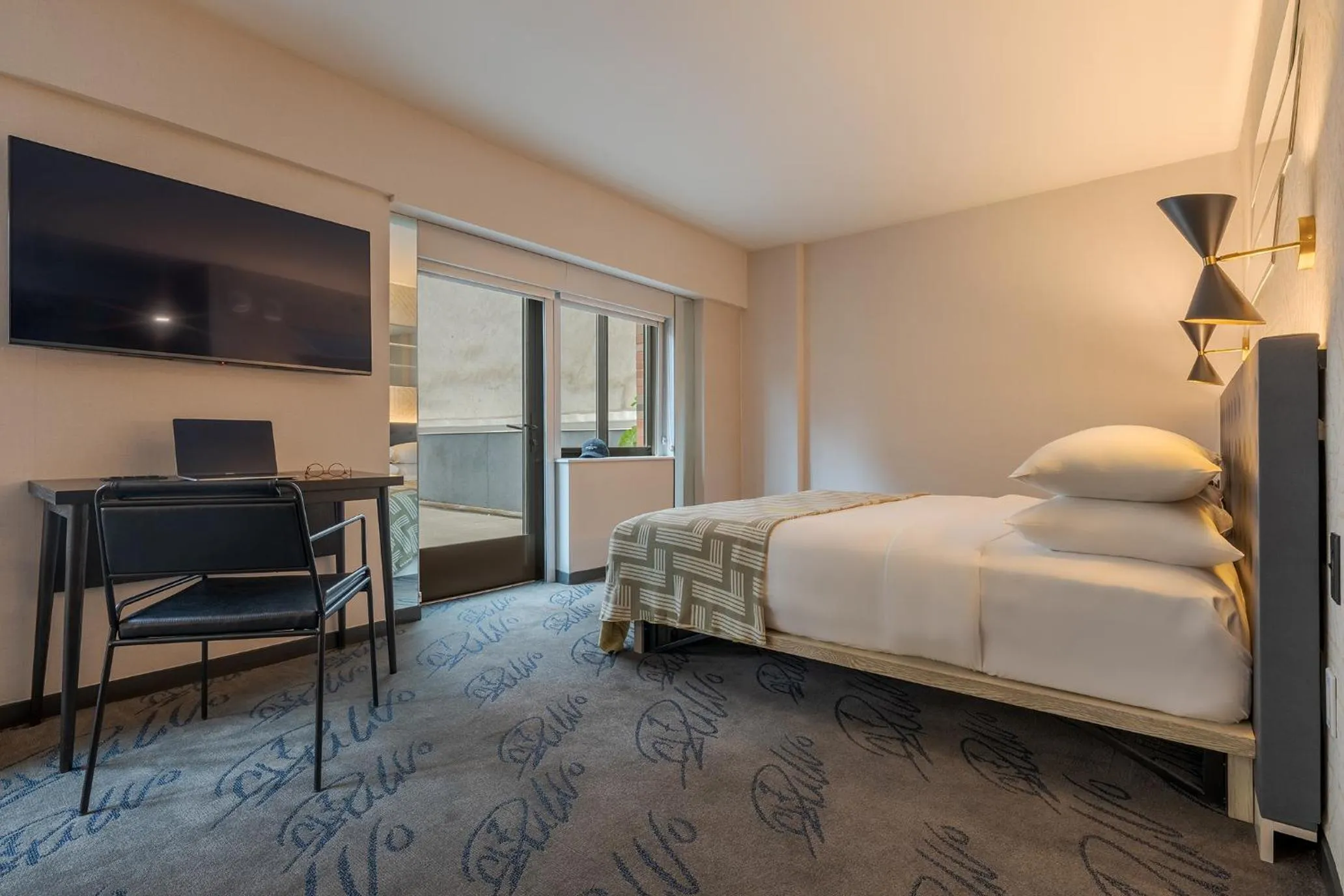 Photo of the whole room, Bed in Pestana CR7 Times Square