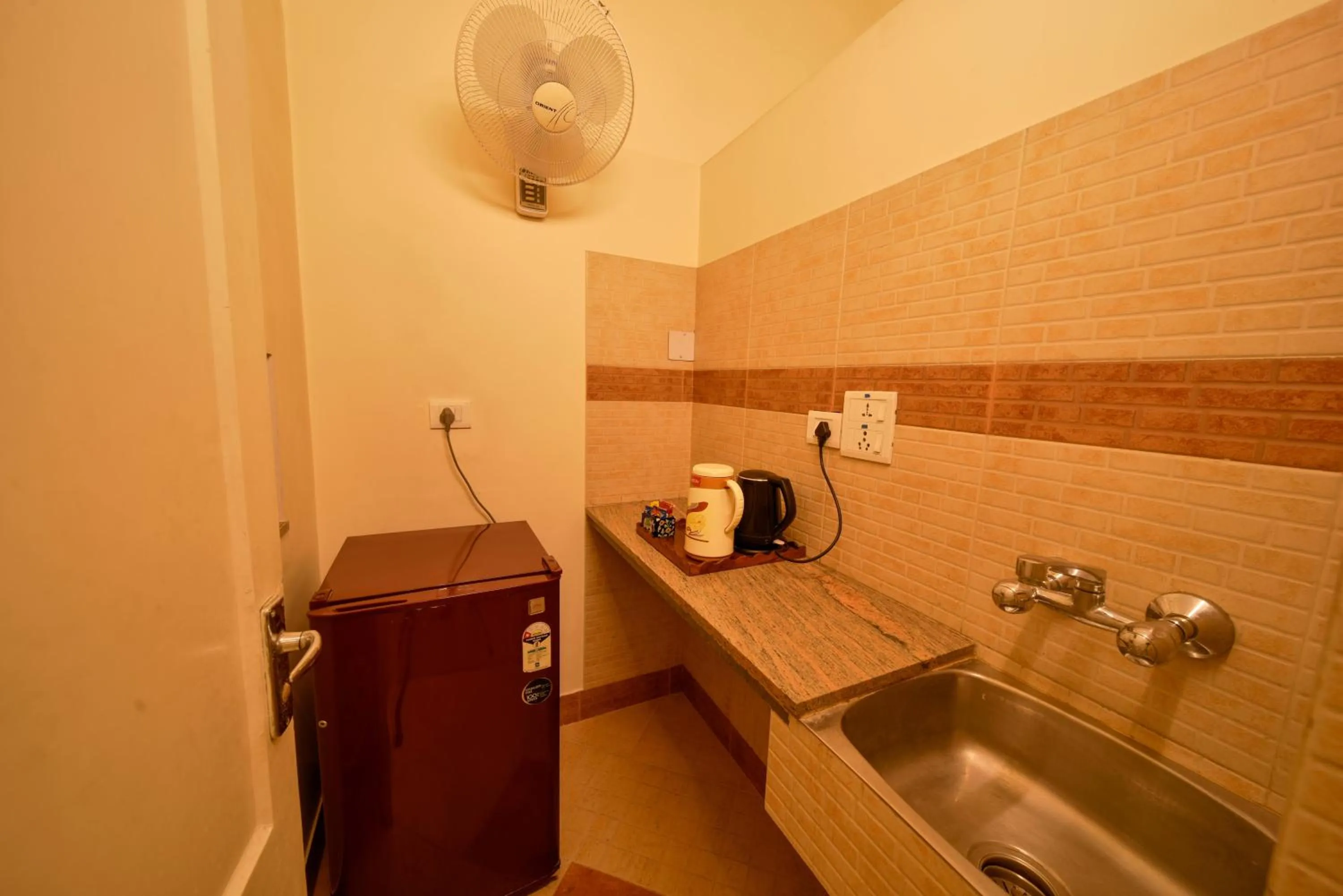 Kitchen or kitchenette in Hotel Arya Niwas