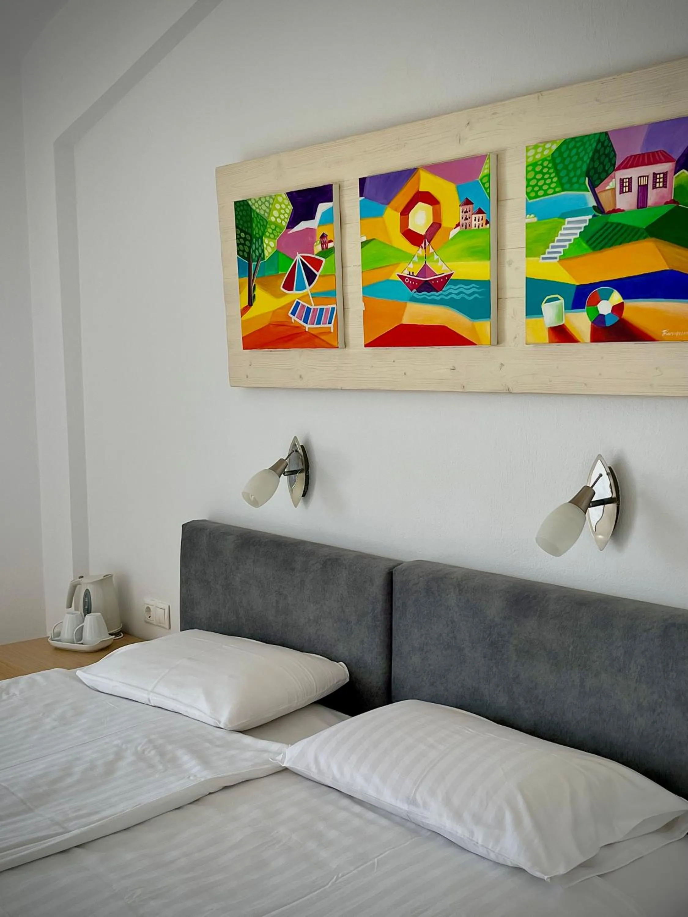 Bed in Anemoni Beach Hotel