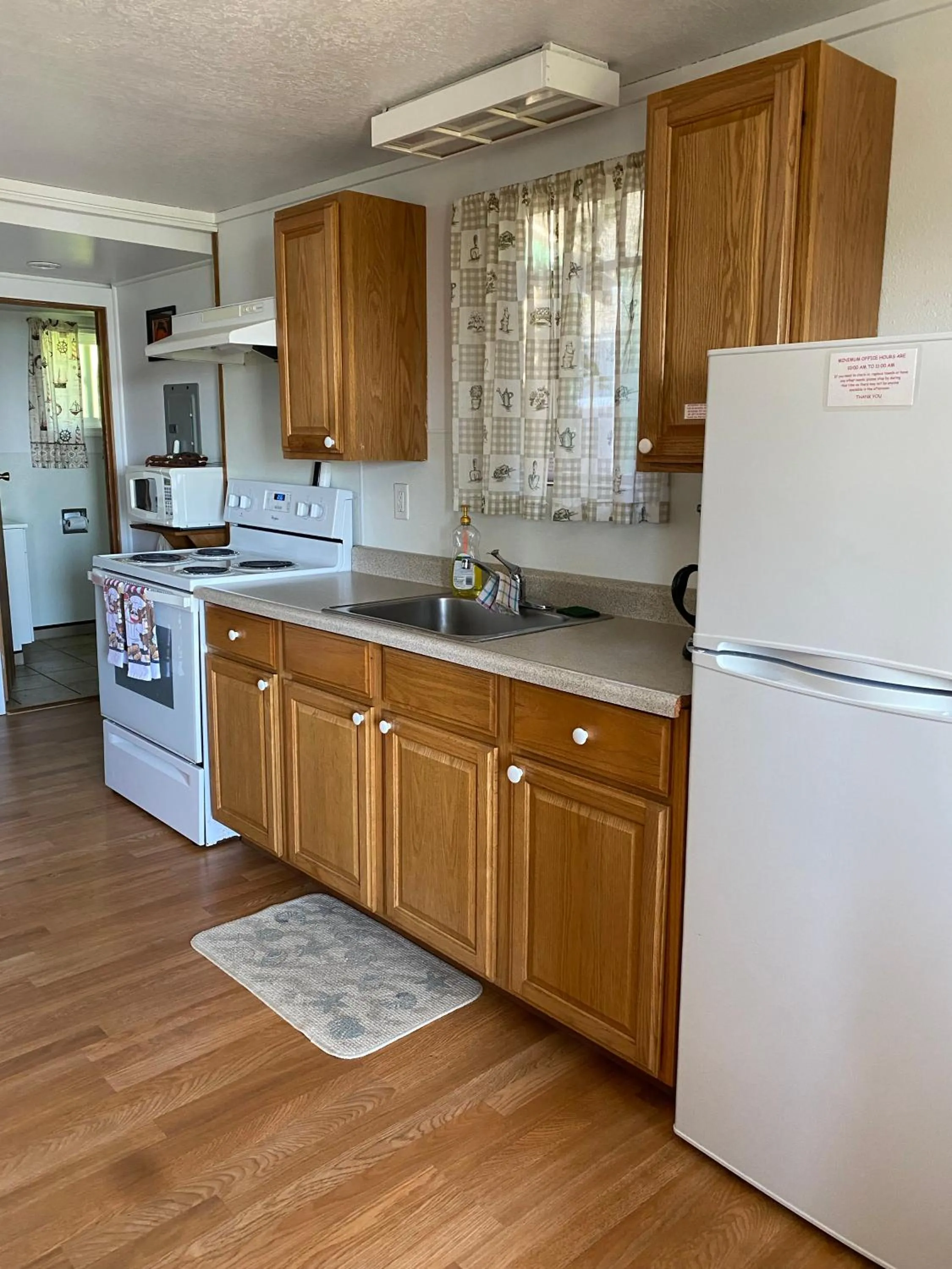Kitchen or kitchenette in Oceanside Ocean Front Cabins