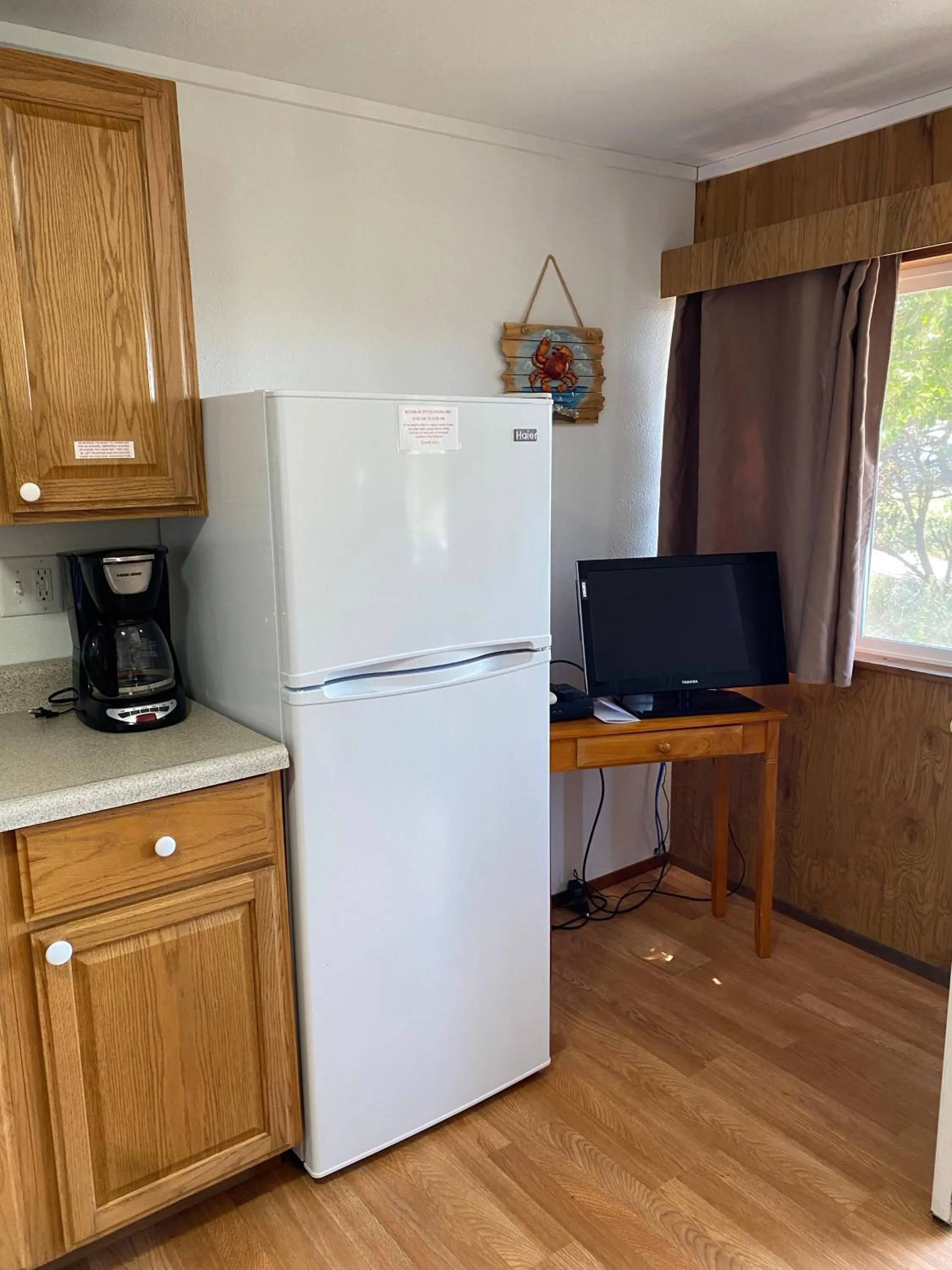 Kitchen or kitchenette in Oceanside Ocean Front Cabins