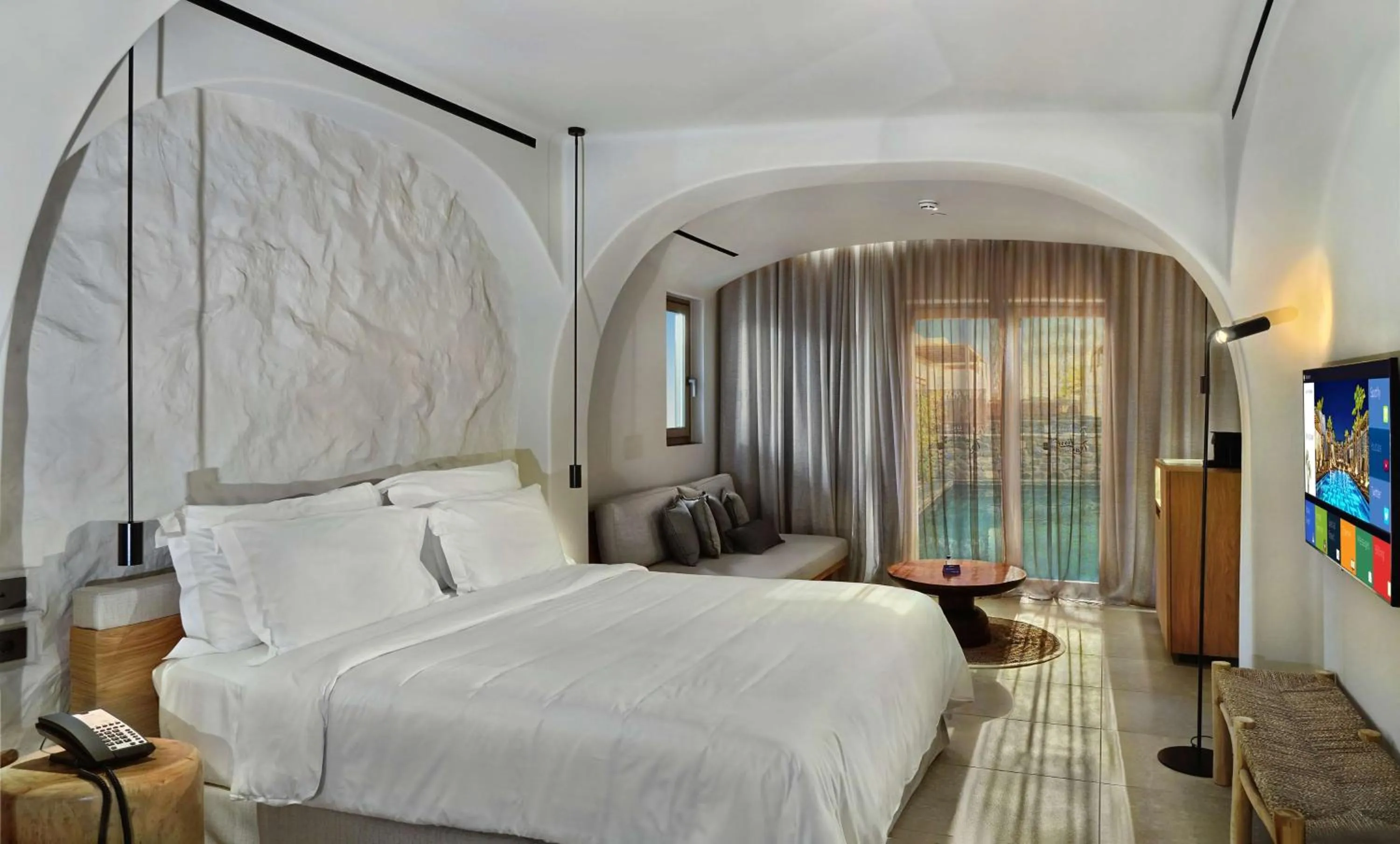 Photo of the whole room, Bed in Radisson Blu Zaffron Resort, Santorini