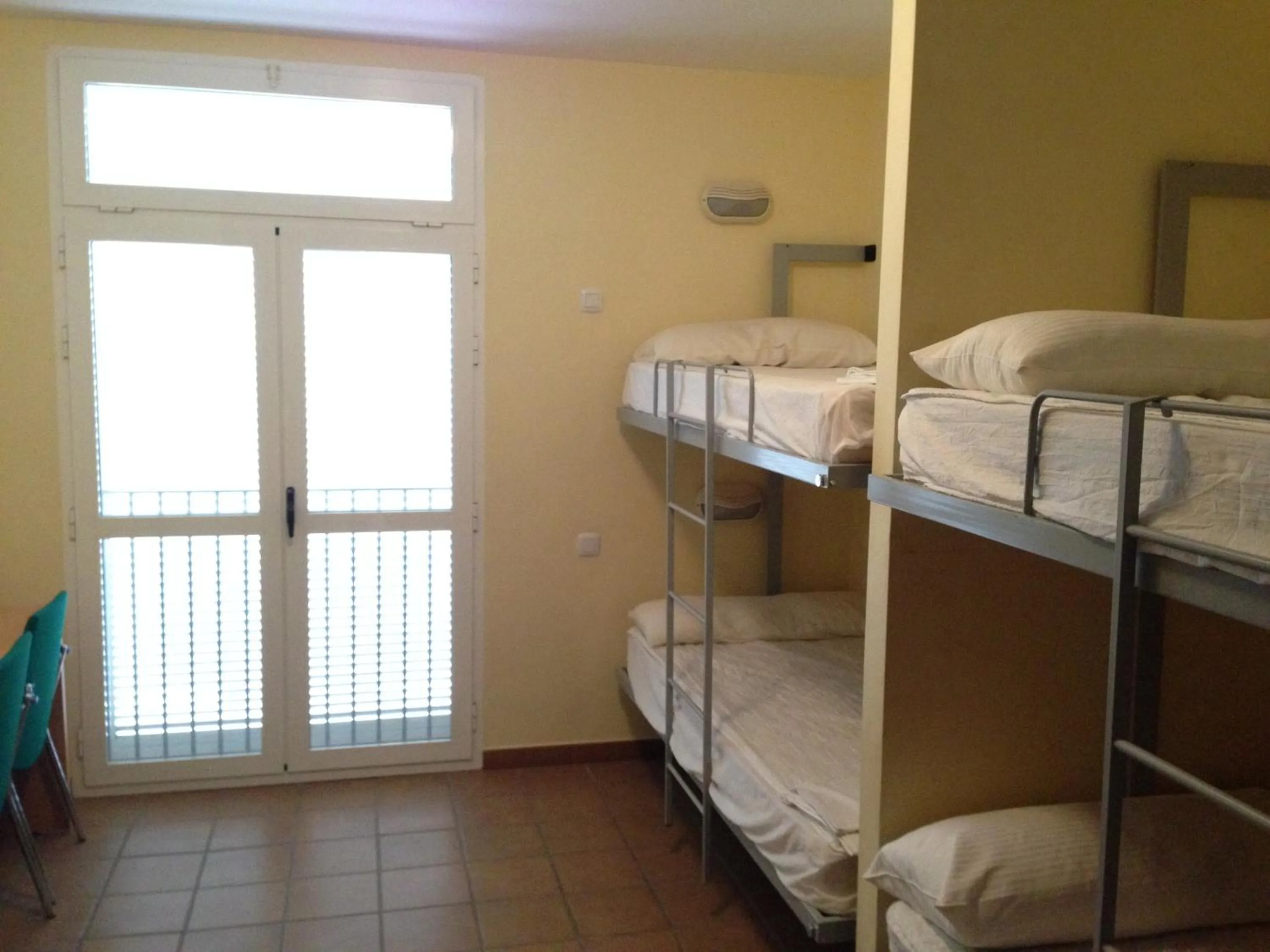 Bed in Albergue De Puntas De Calnegre