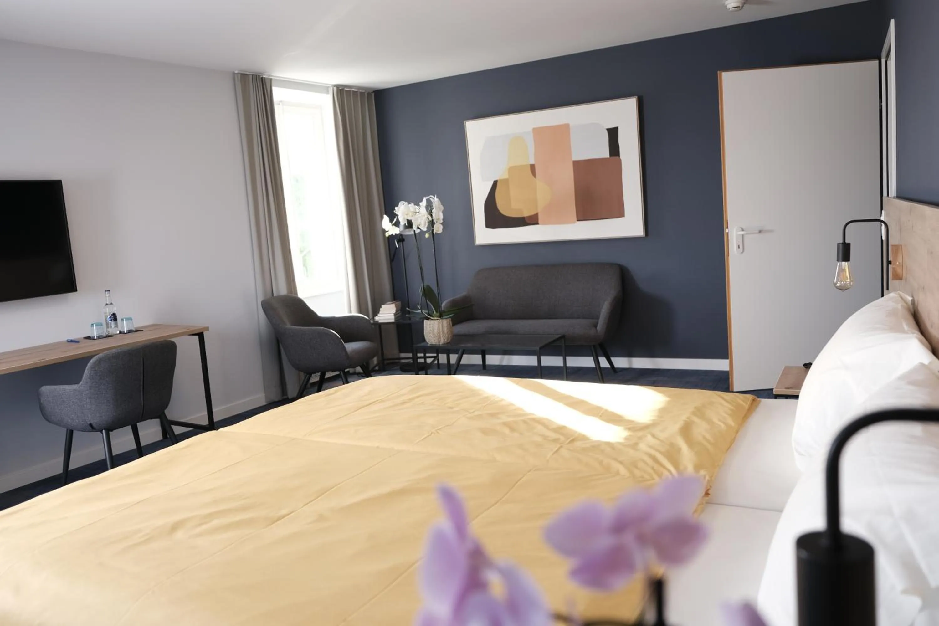 Bed in Boutique Hôtel de l'Ecu Vaudois