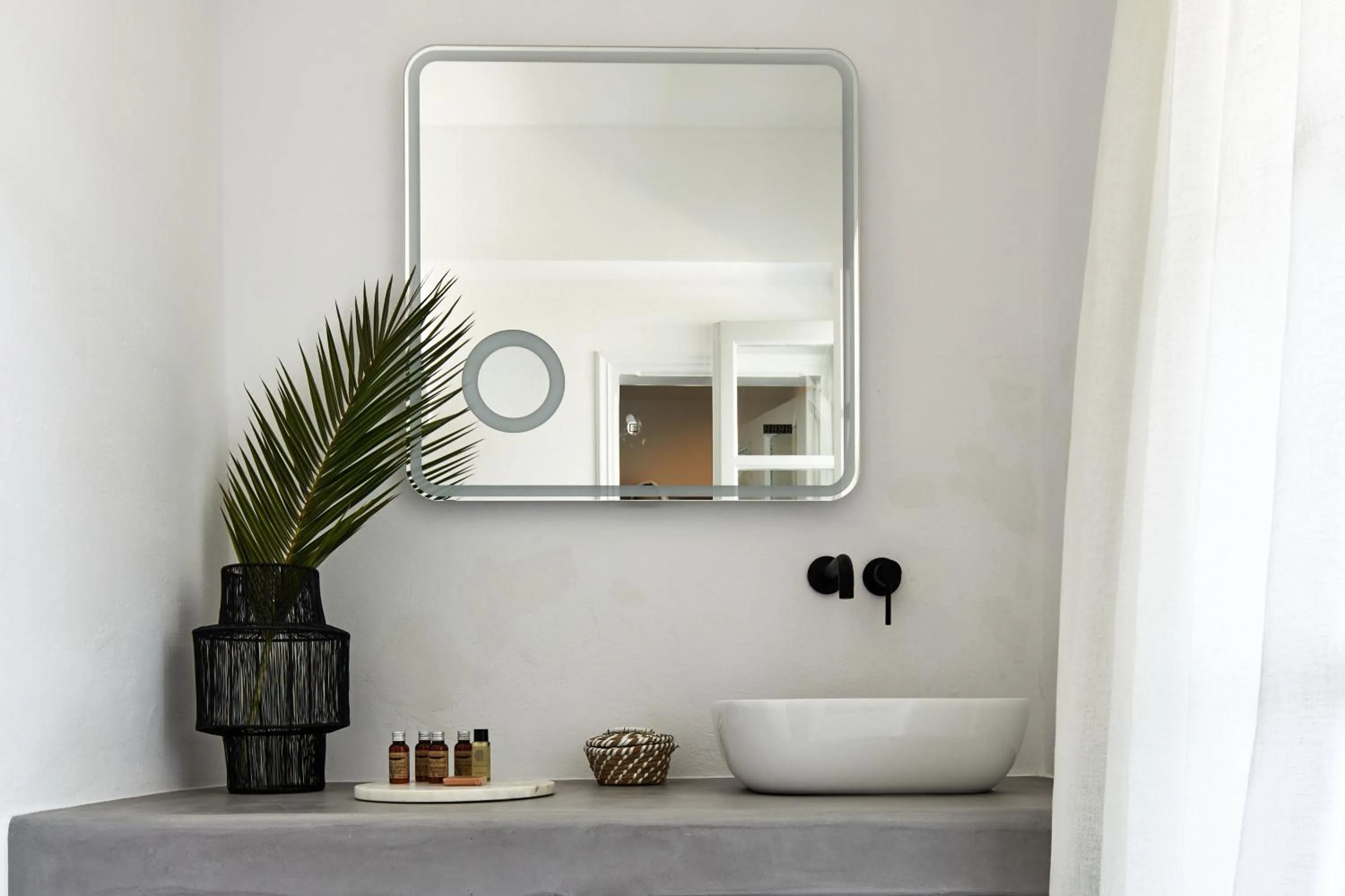 Bathroom in Symmetry Suites