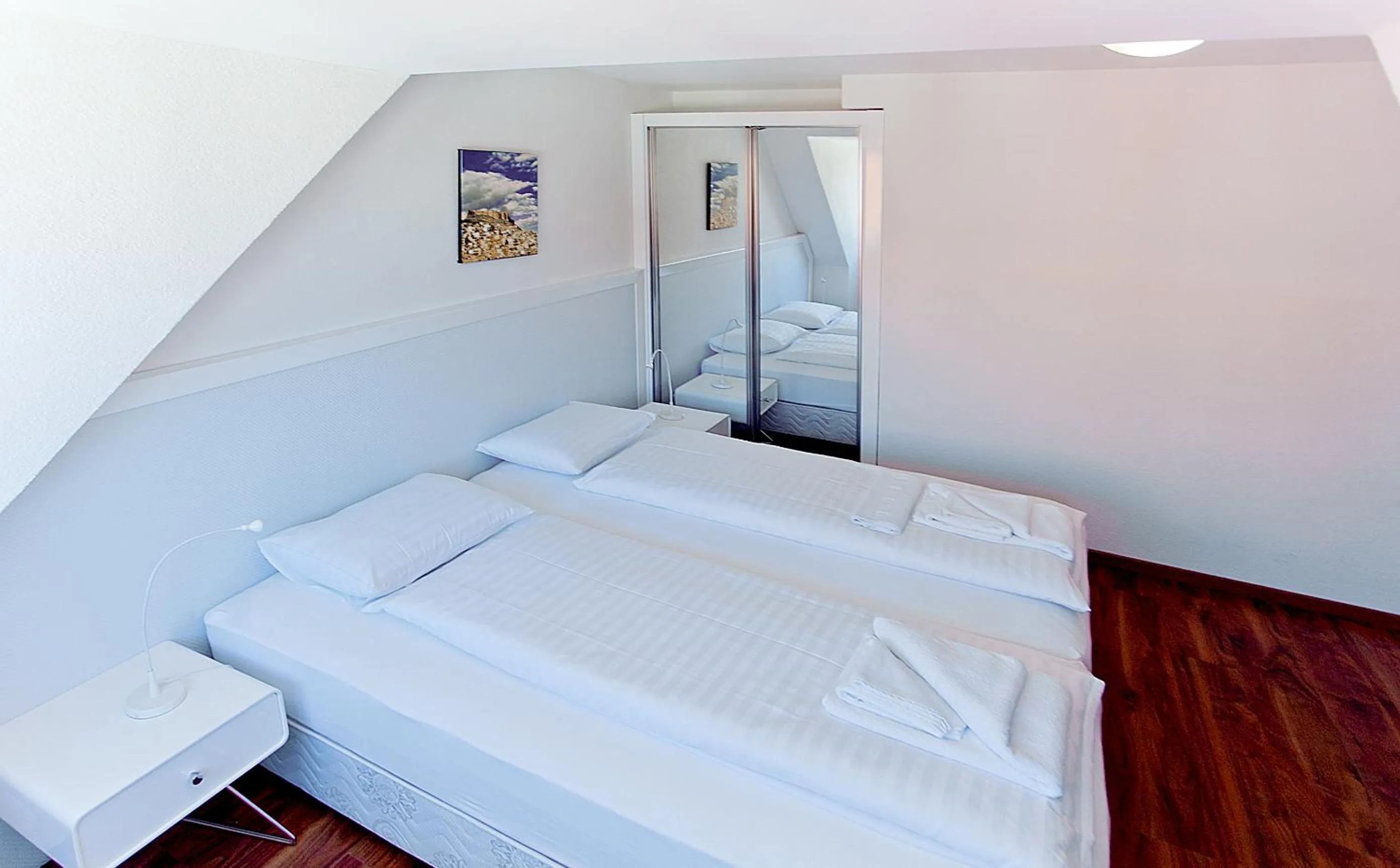 Bed in Premium Apartments by Livingdowntown