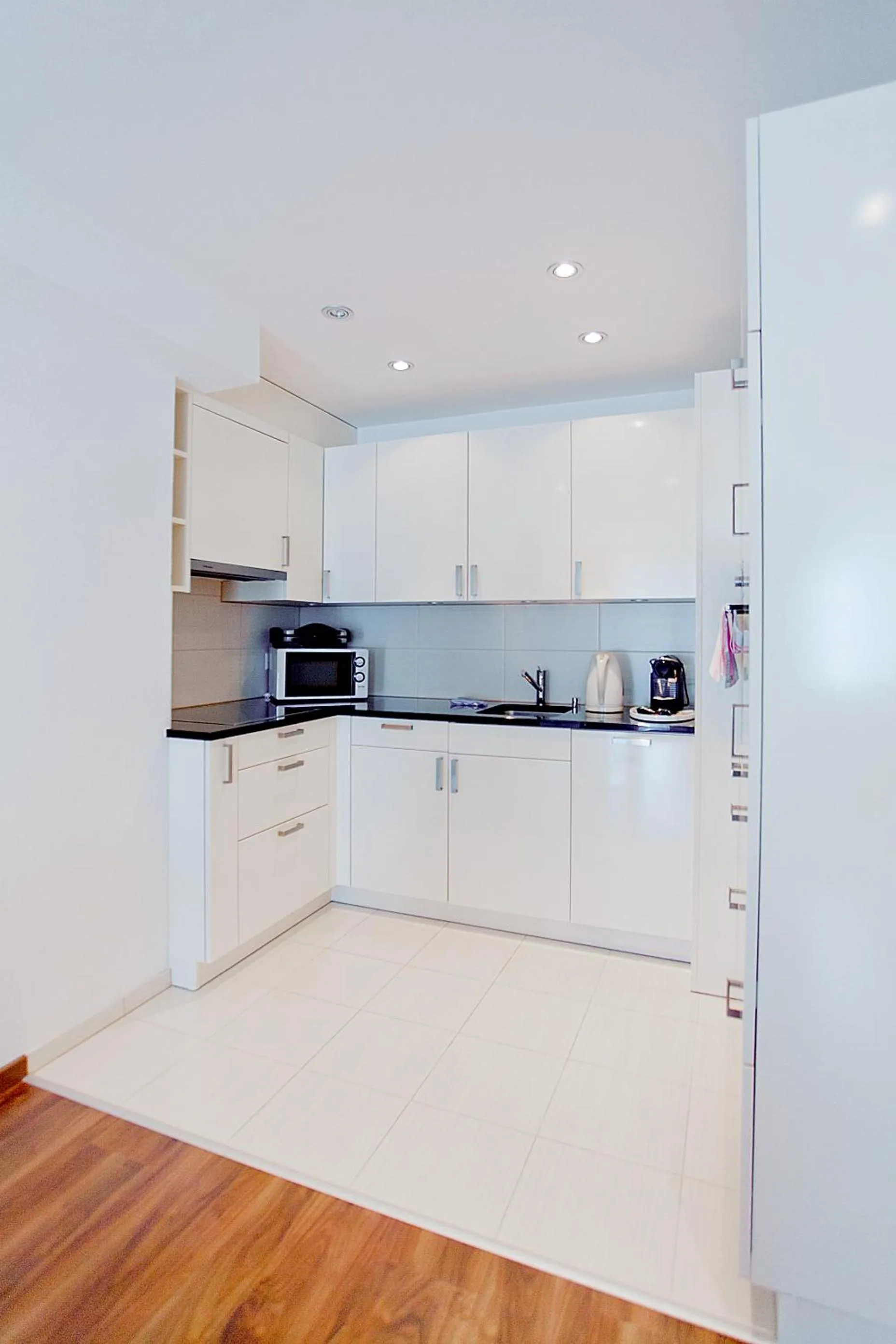 Kitchen or kitchenette in Premium Apartments by Livingdowntown