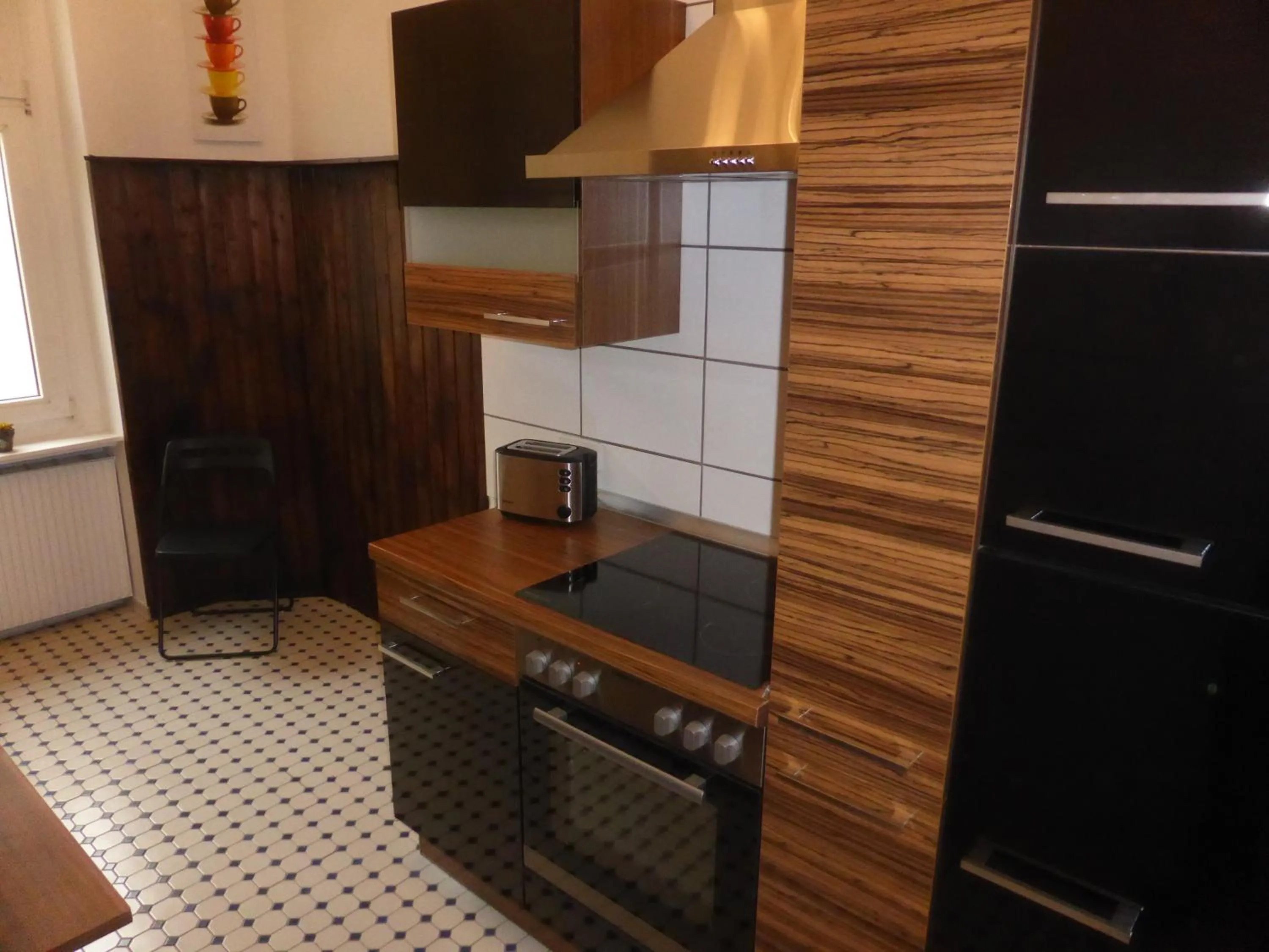 Kitchen or kitchenette in Apartments Dahlie & Nelke