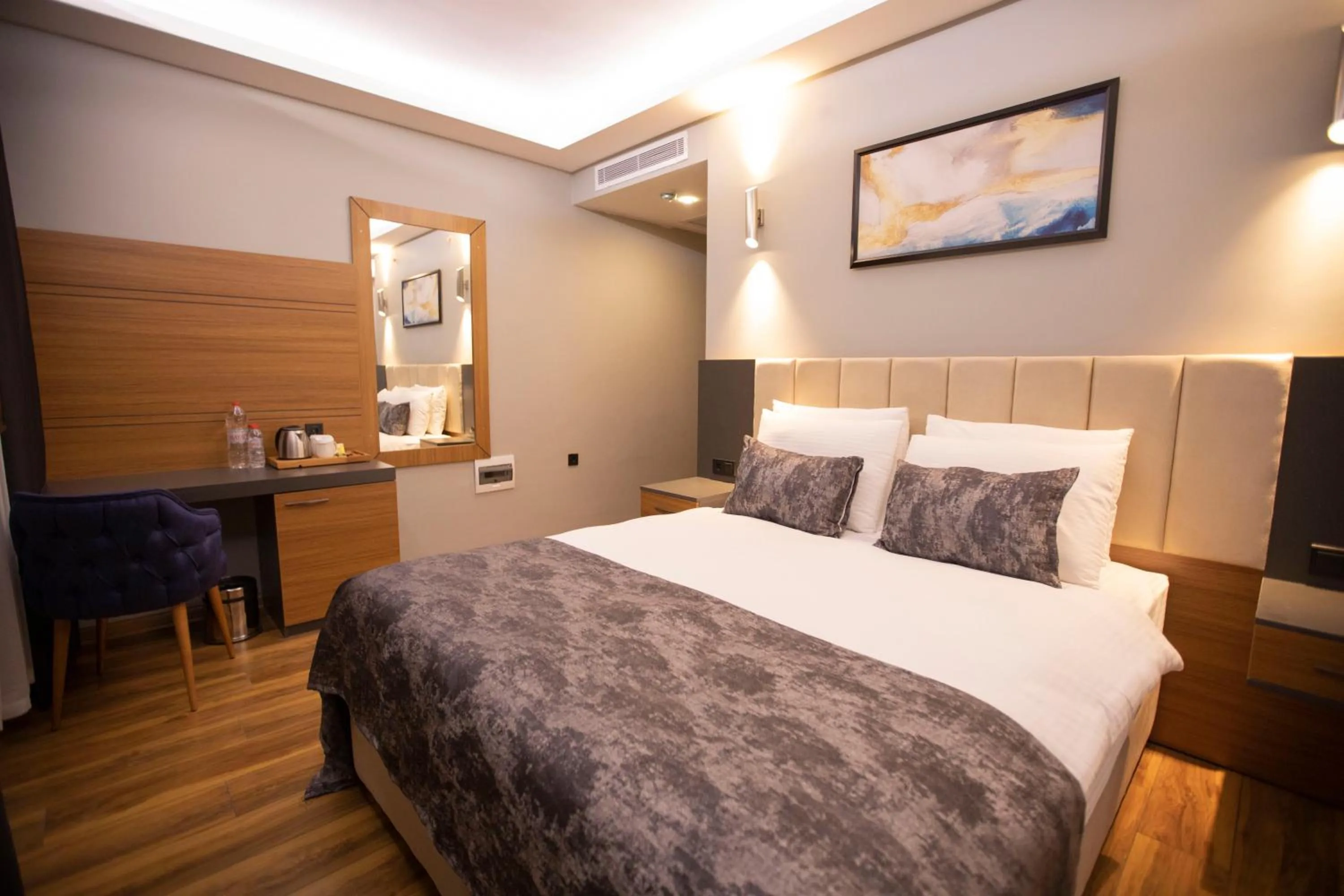 Bed in Divares Luxury Hotel