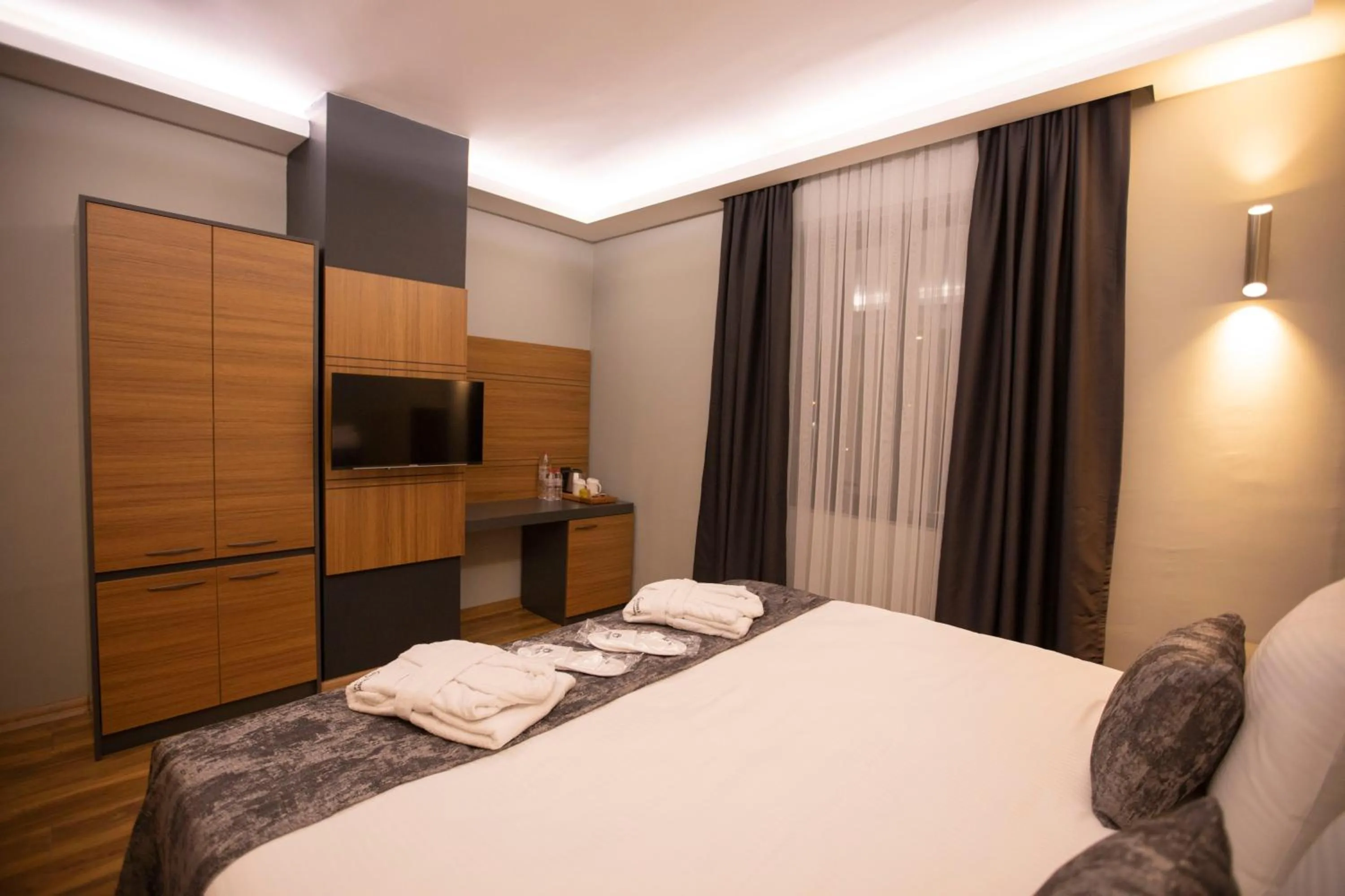 Bed in Divares Luxury Hotel