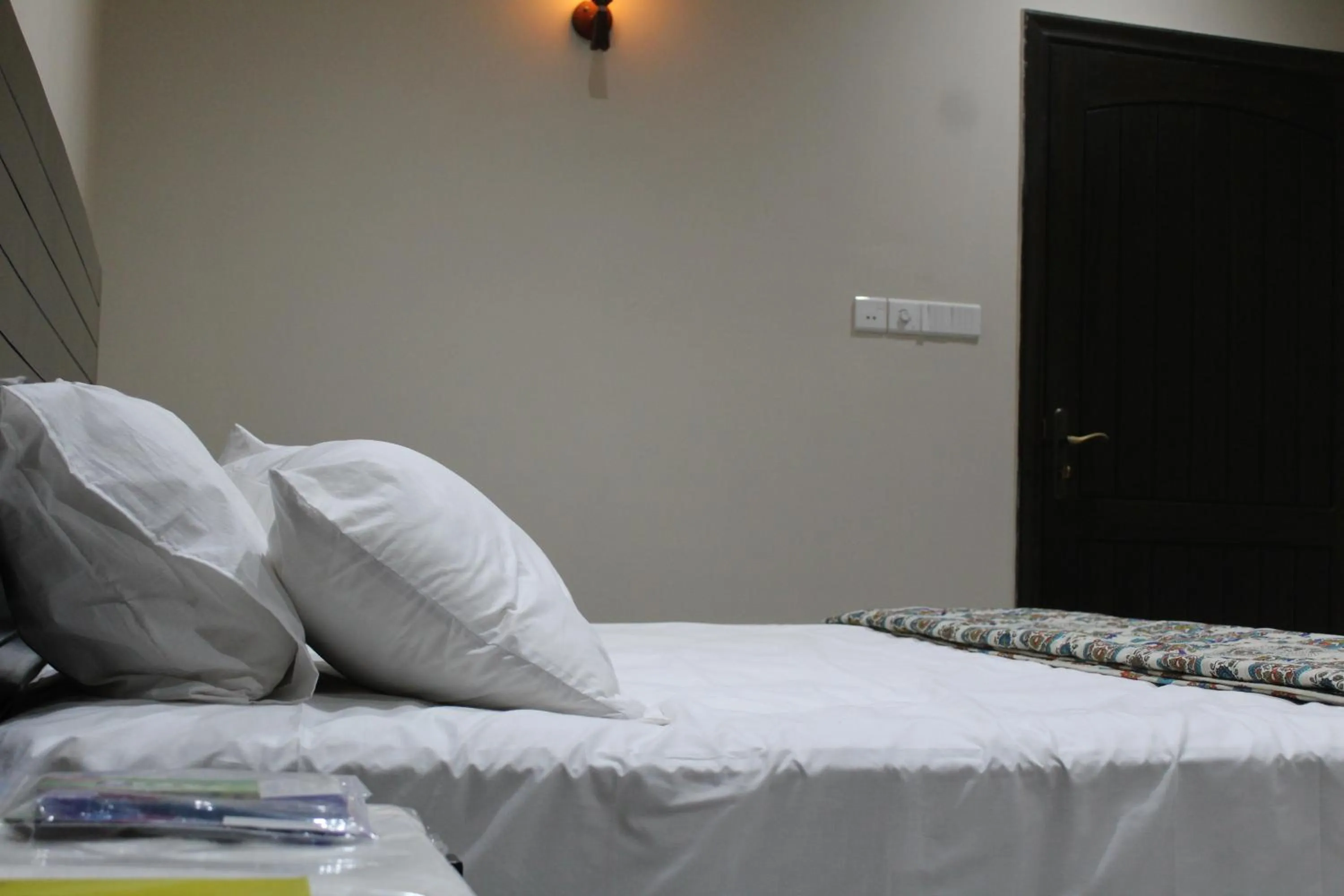 Bed in HOTEL STATE RESIDENCY