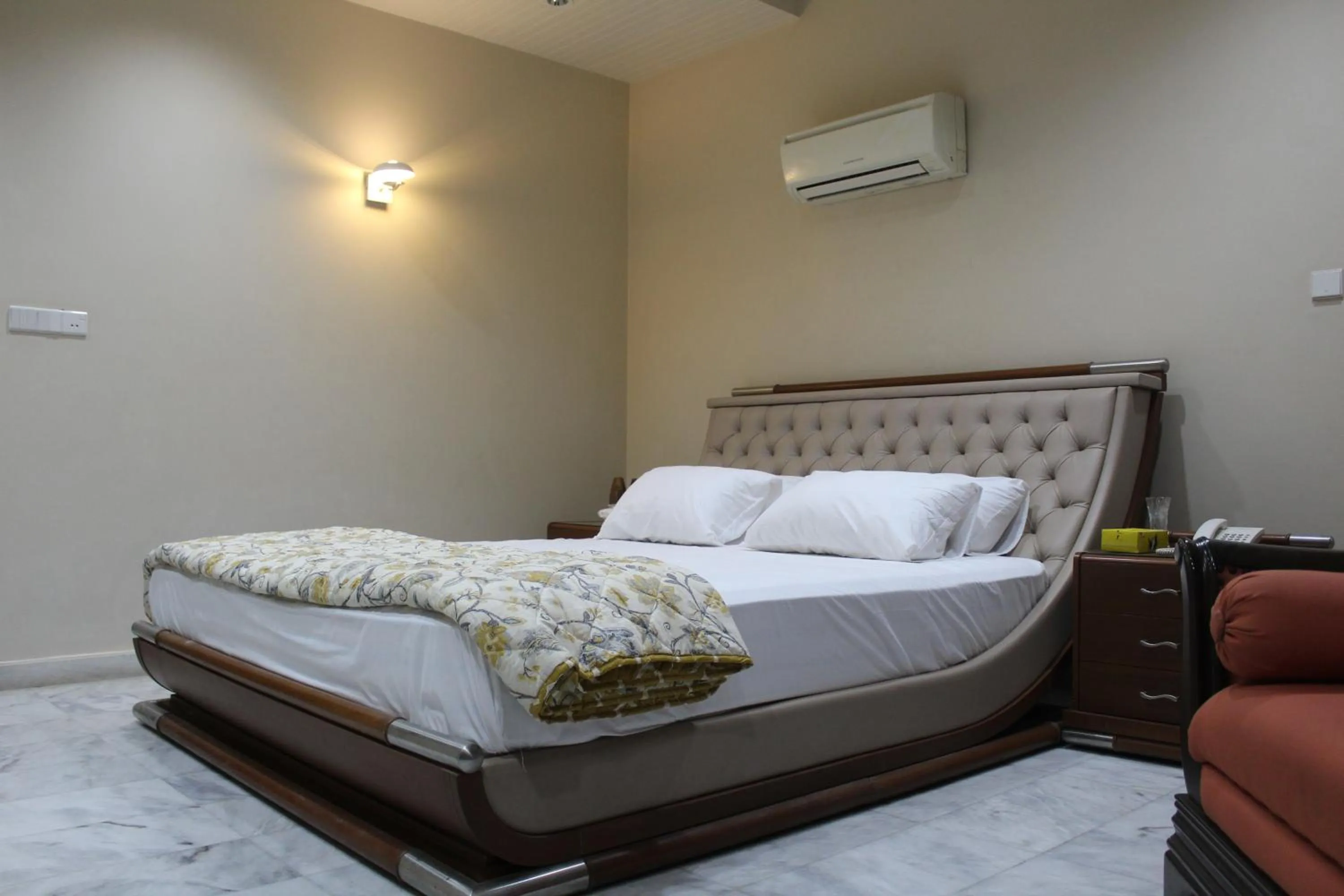 Bed in HOTEL STATE RESIDENCY