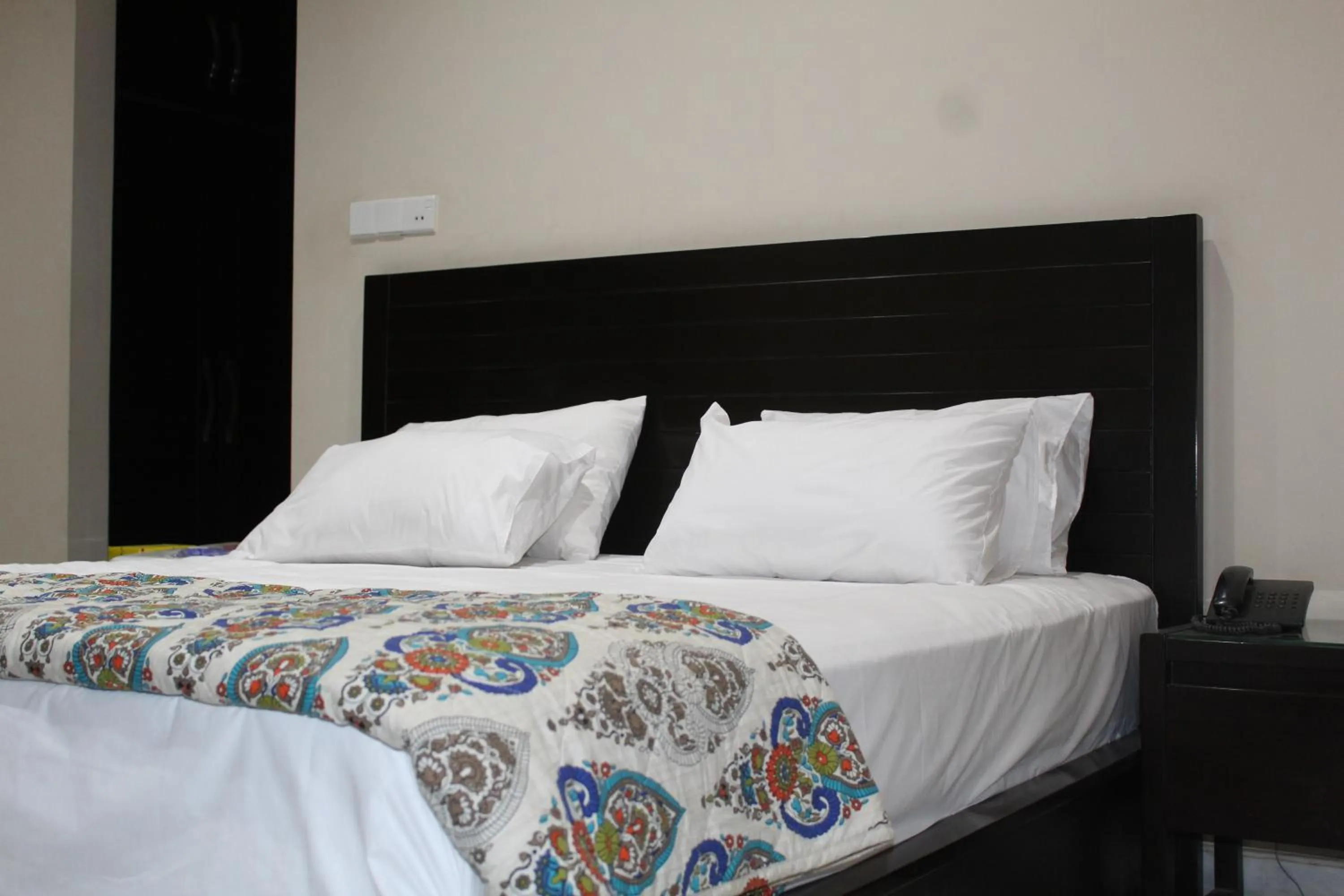 Bed in HOTEL STATE RESIDENCY