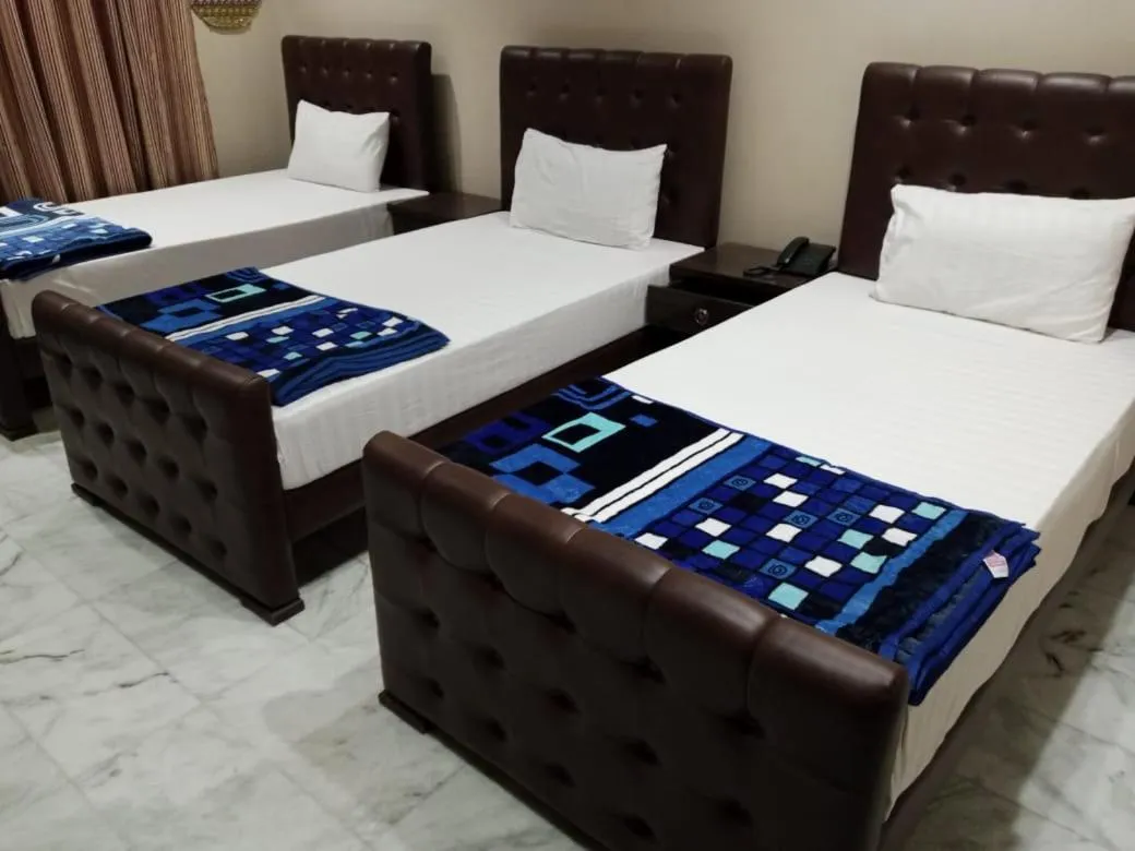 Bed in HOTEL STATE RESIDENCY