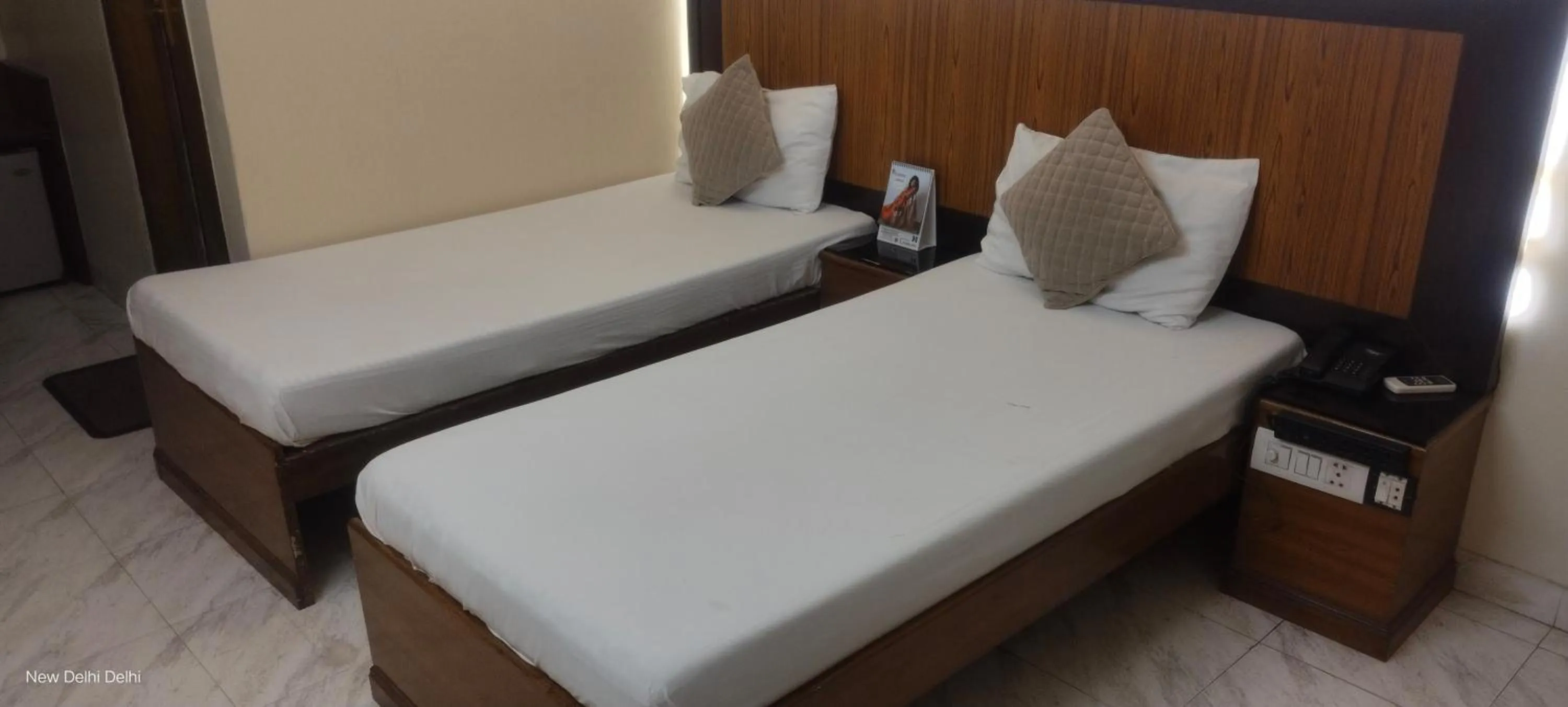 Bed in The C Park Inn Karol Bagh Homely Atmosphere