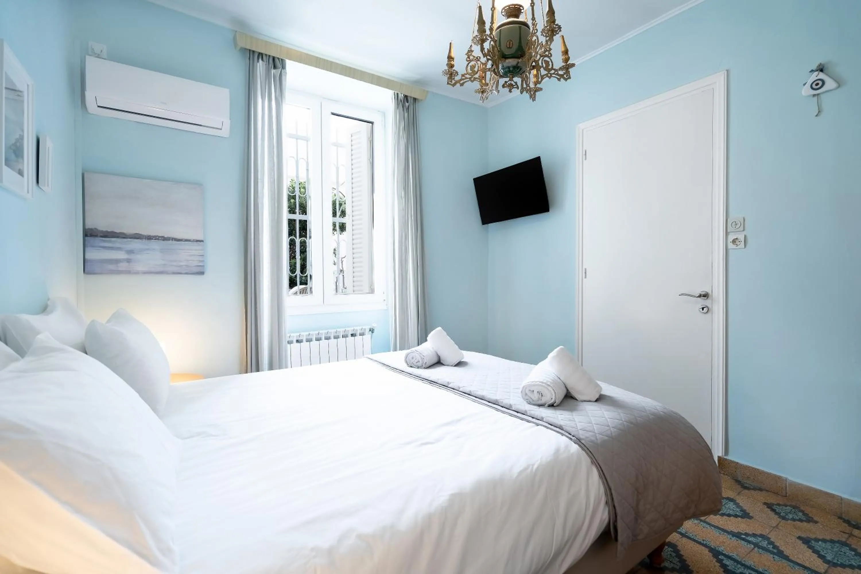 Bed in Neoclassical Mansion in Andros Town by Explore Andros