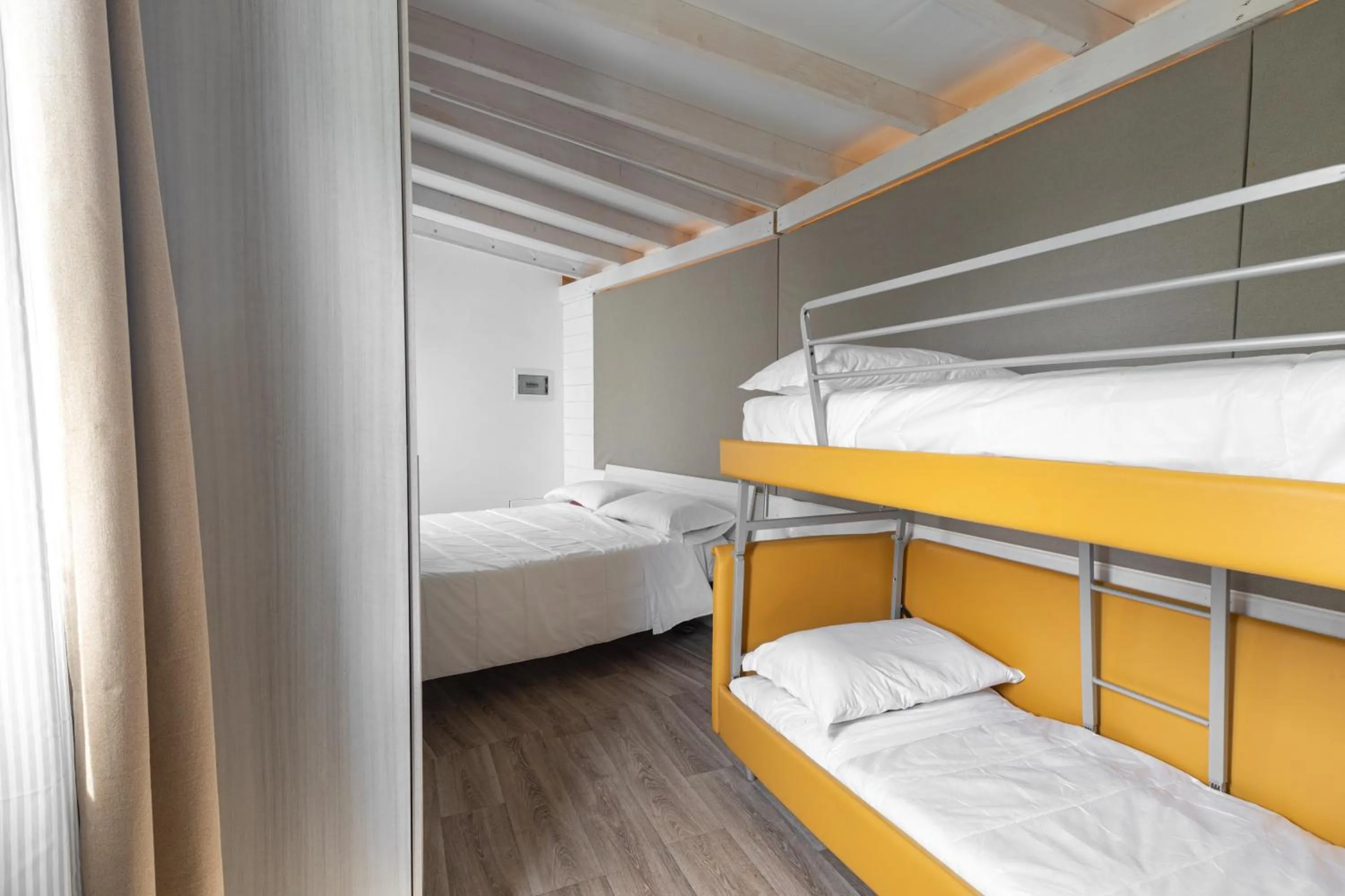 Bedroom, Bed in La Valle Dei Caprioli Village Bungalow Park - Freelandia Azienda Agricola