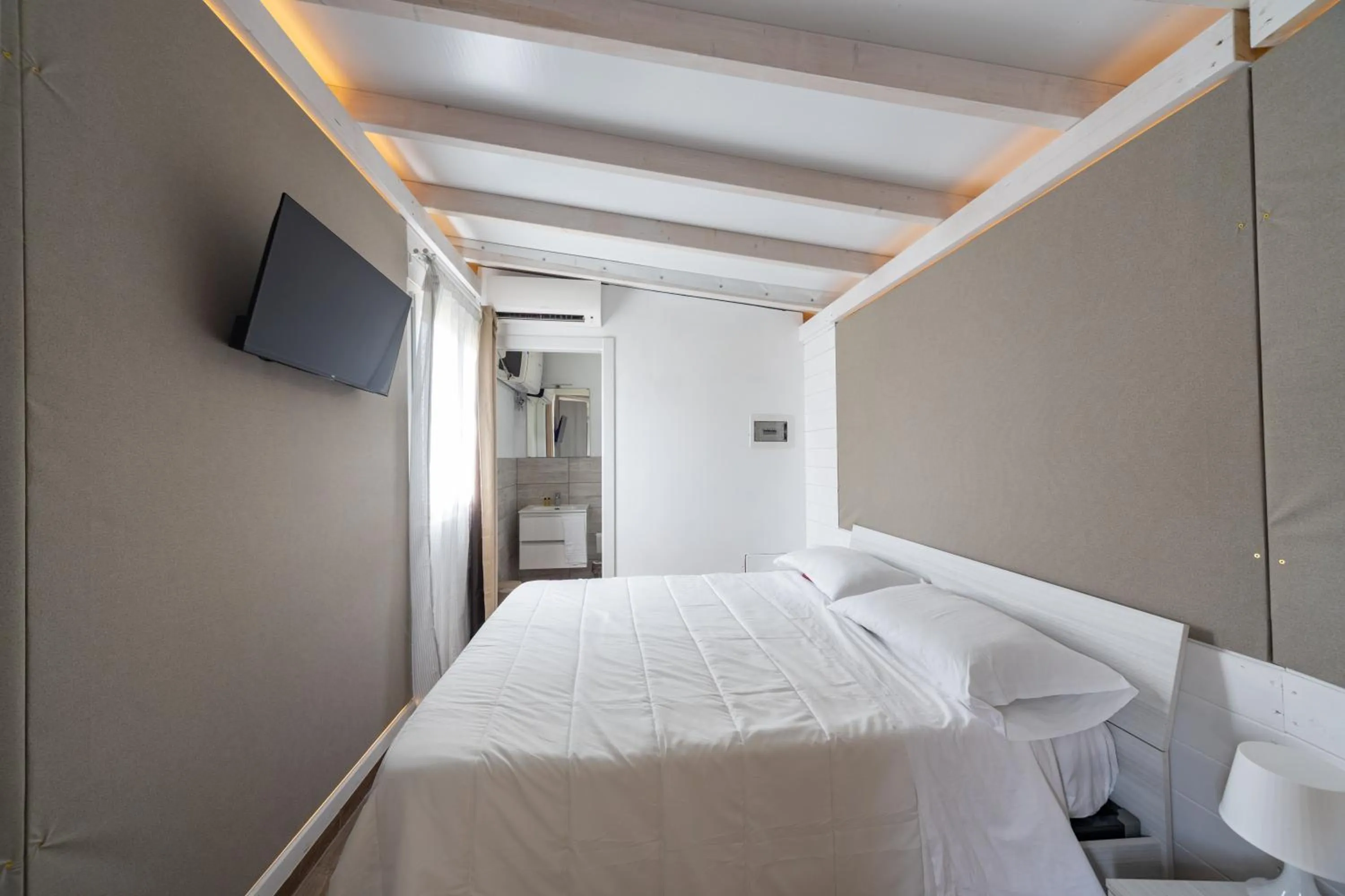 Bedroom, Bed in La Valle Dei Caprioli Village Bungalow Park - Freelandia Azienda Agricola