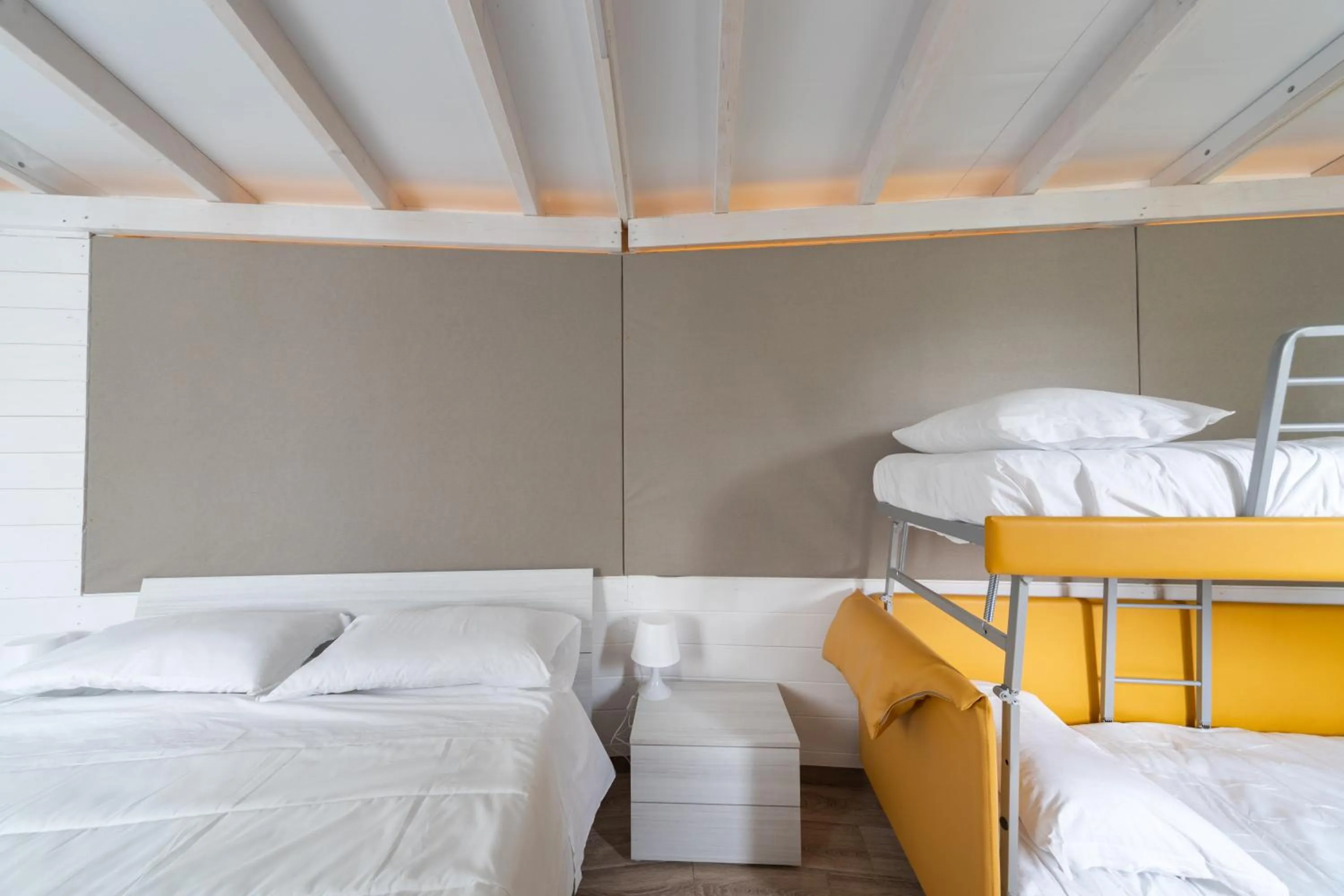 Bedroom, Bed in La Valle Dei Caprioli Village Bungalow Park - Freelandia Azienda Agricola