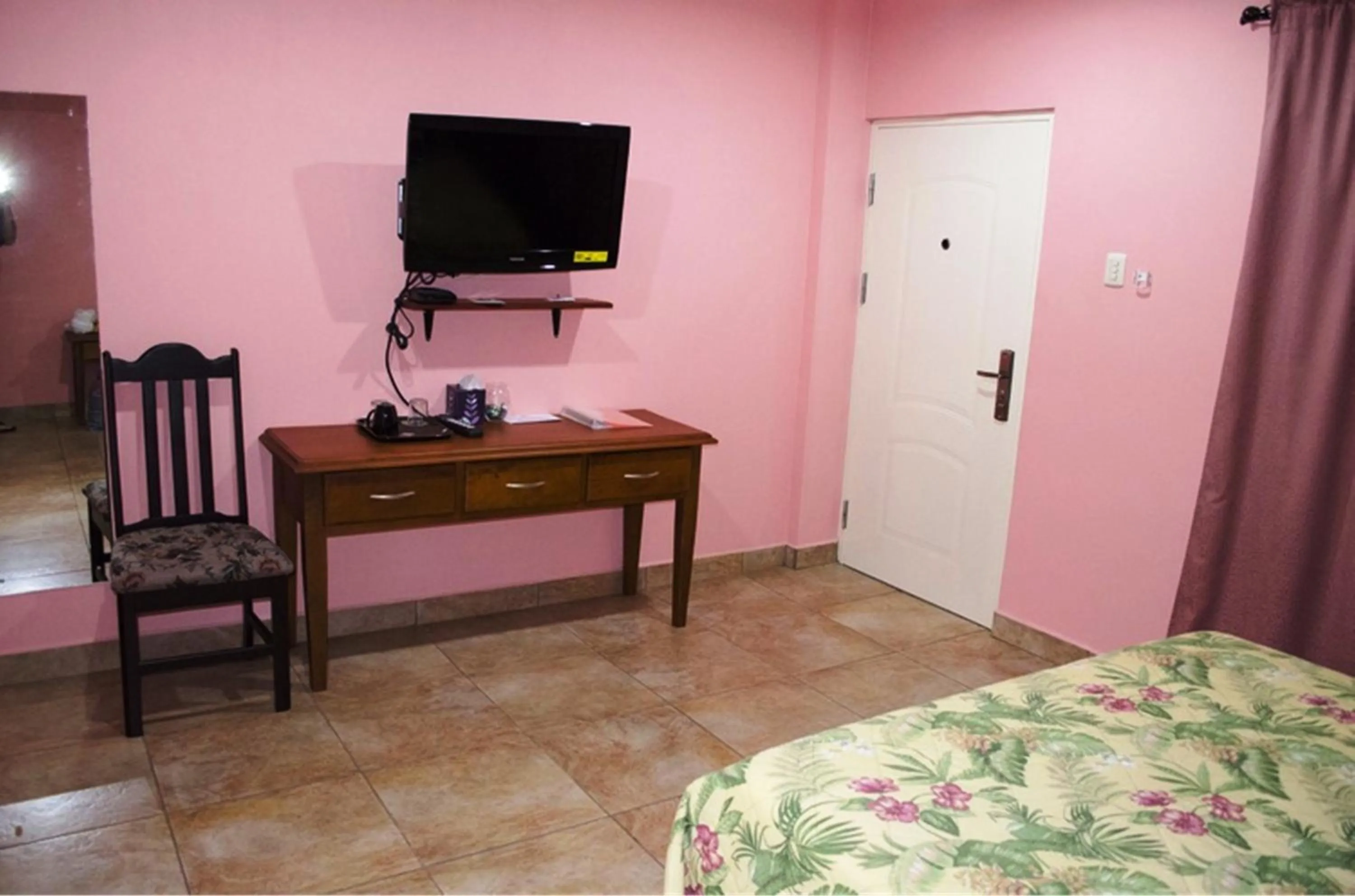 TV and multimedia, Bed in Piarco Village Suites