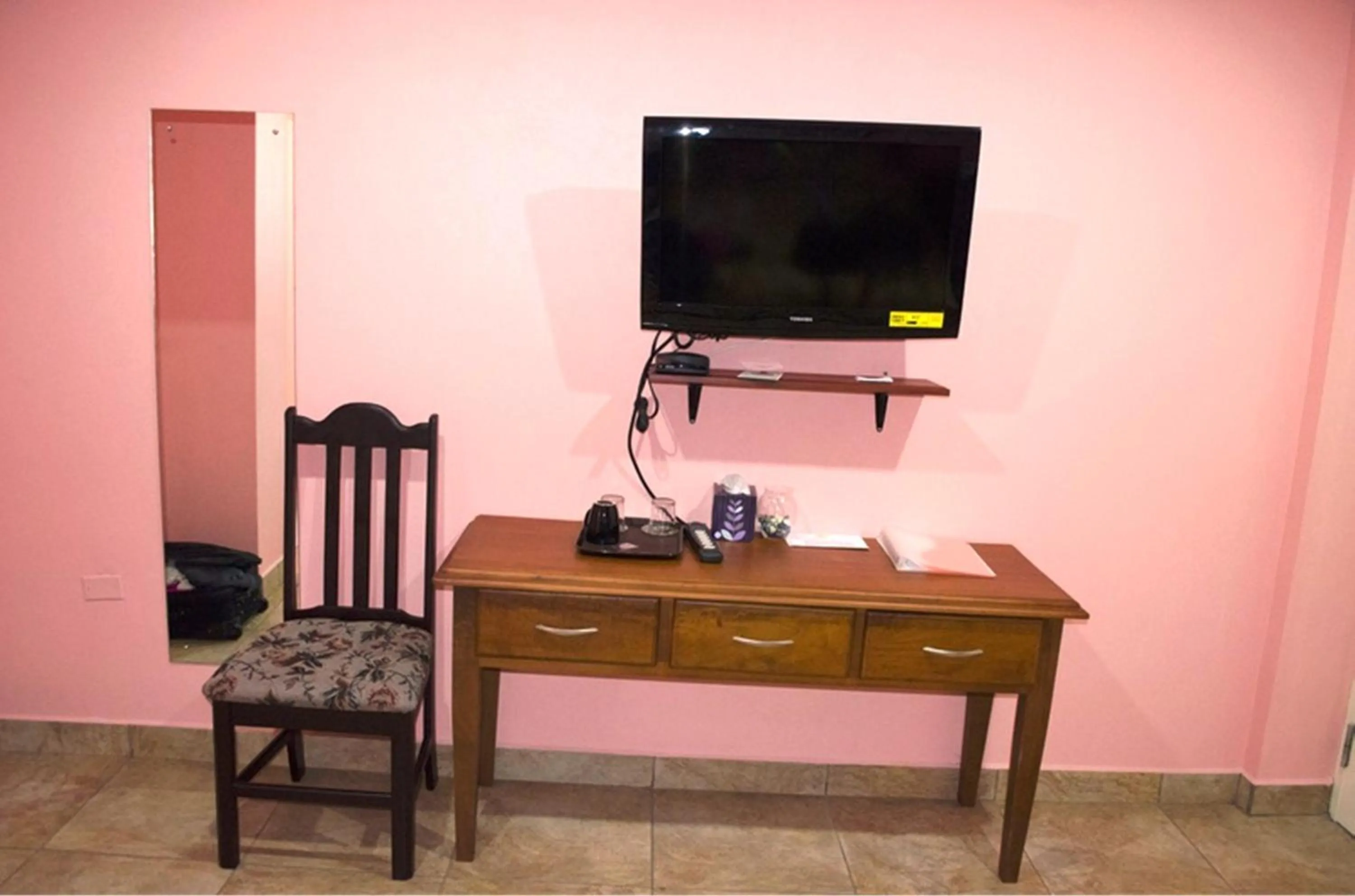 TV and multimedia in Piarco Village Suites