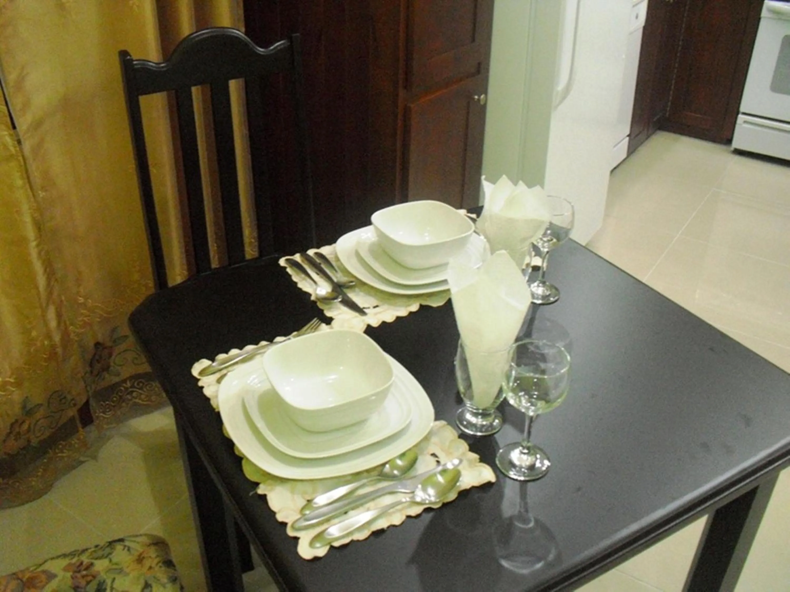 Dining area in Piarco Village Suites