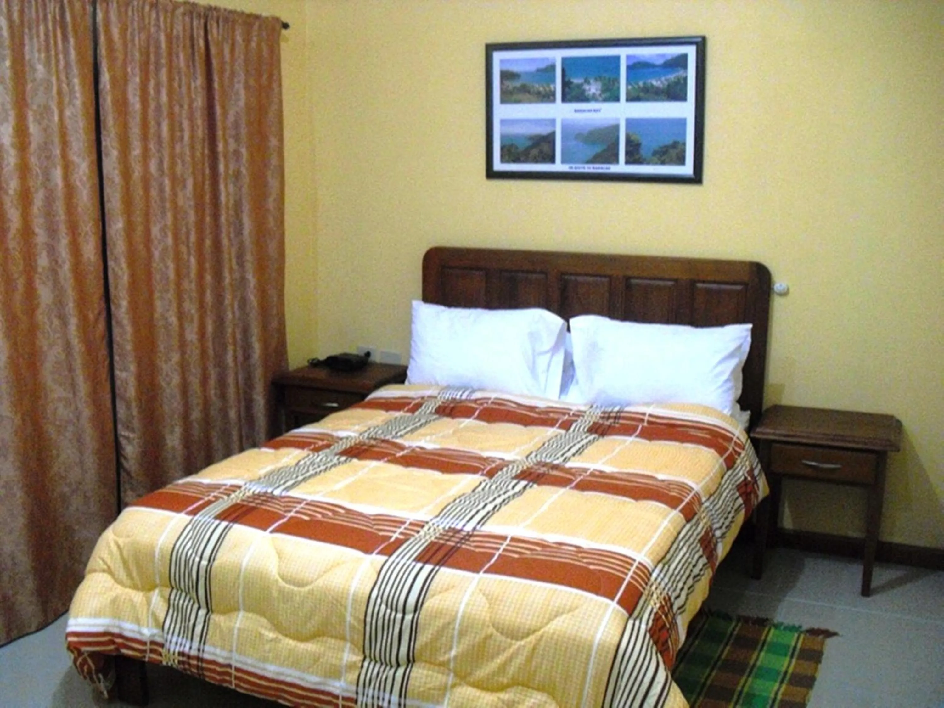 Bedroom, Bed in Piarco Village Suites