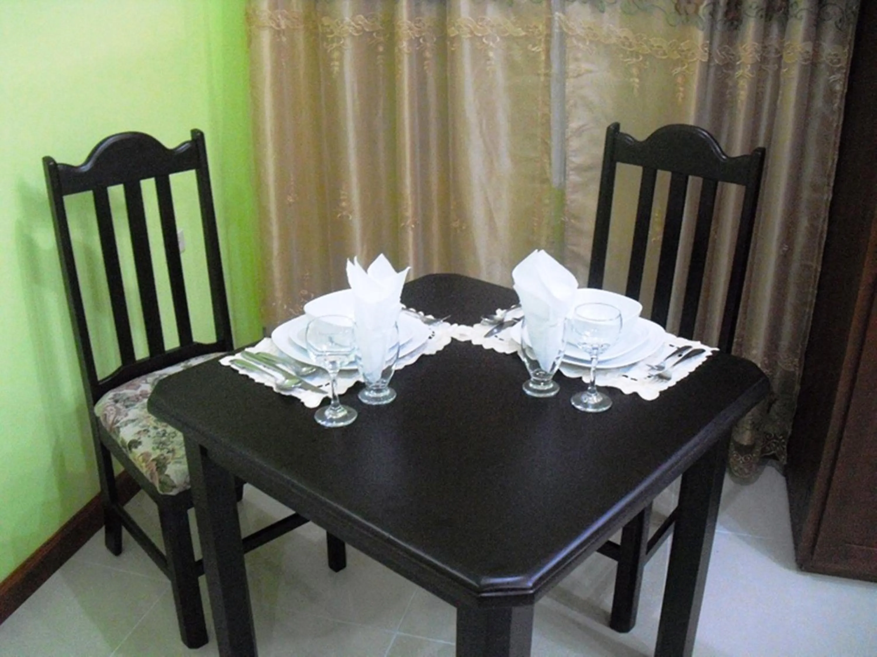Dining area in Piarco Village Suites