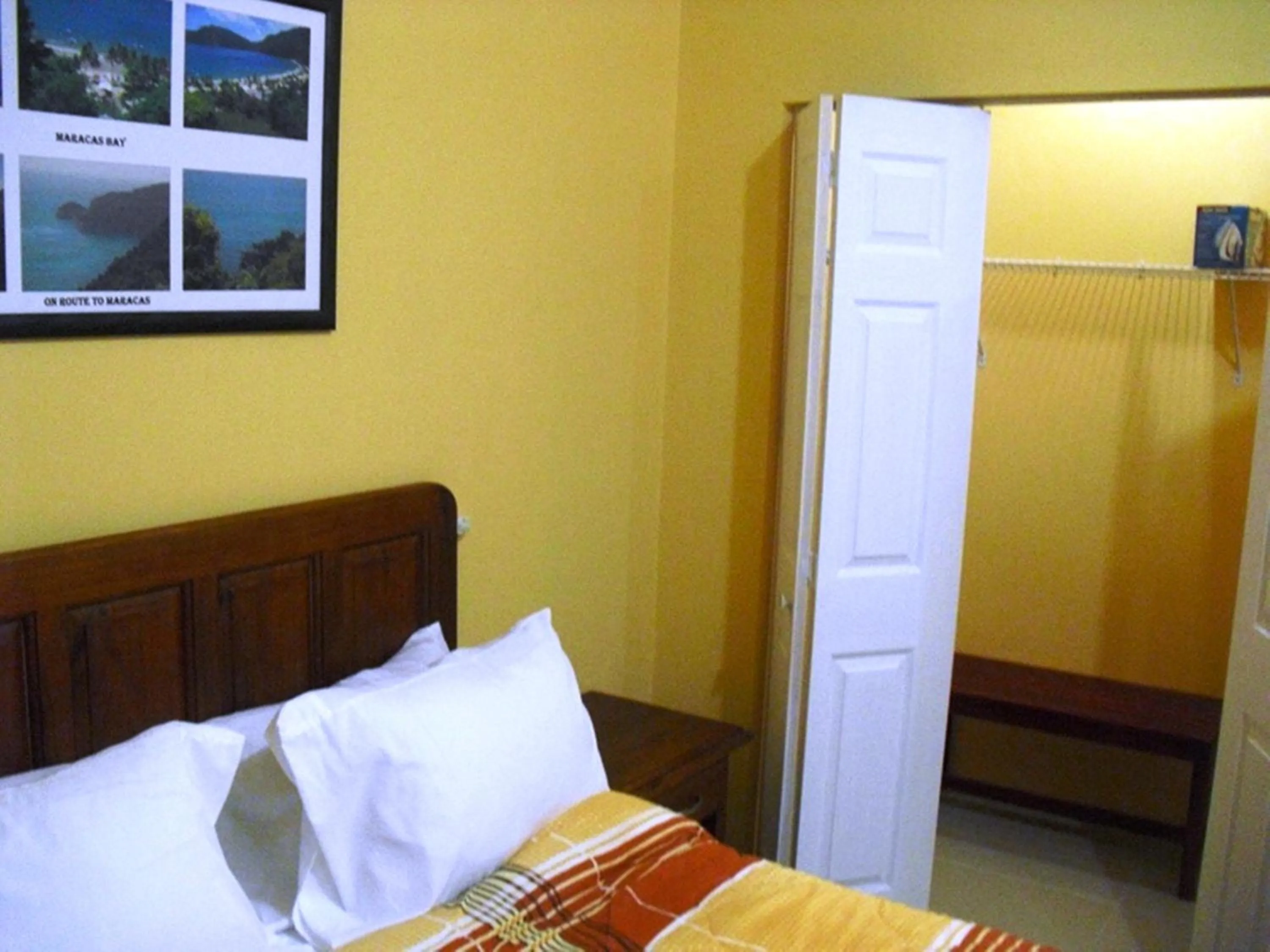 Bedroom, Bed in Piarco Village Suites