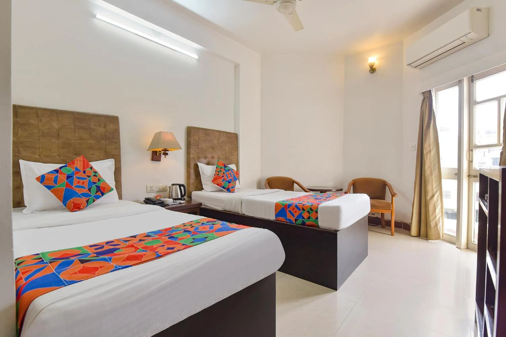 Bed in FabHotel Shikha