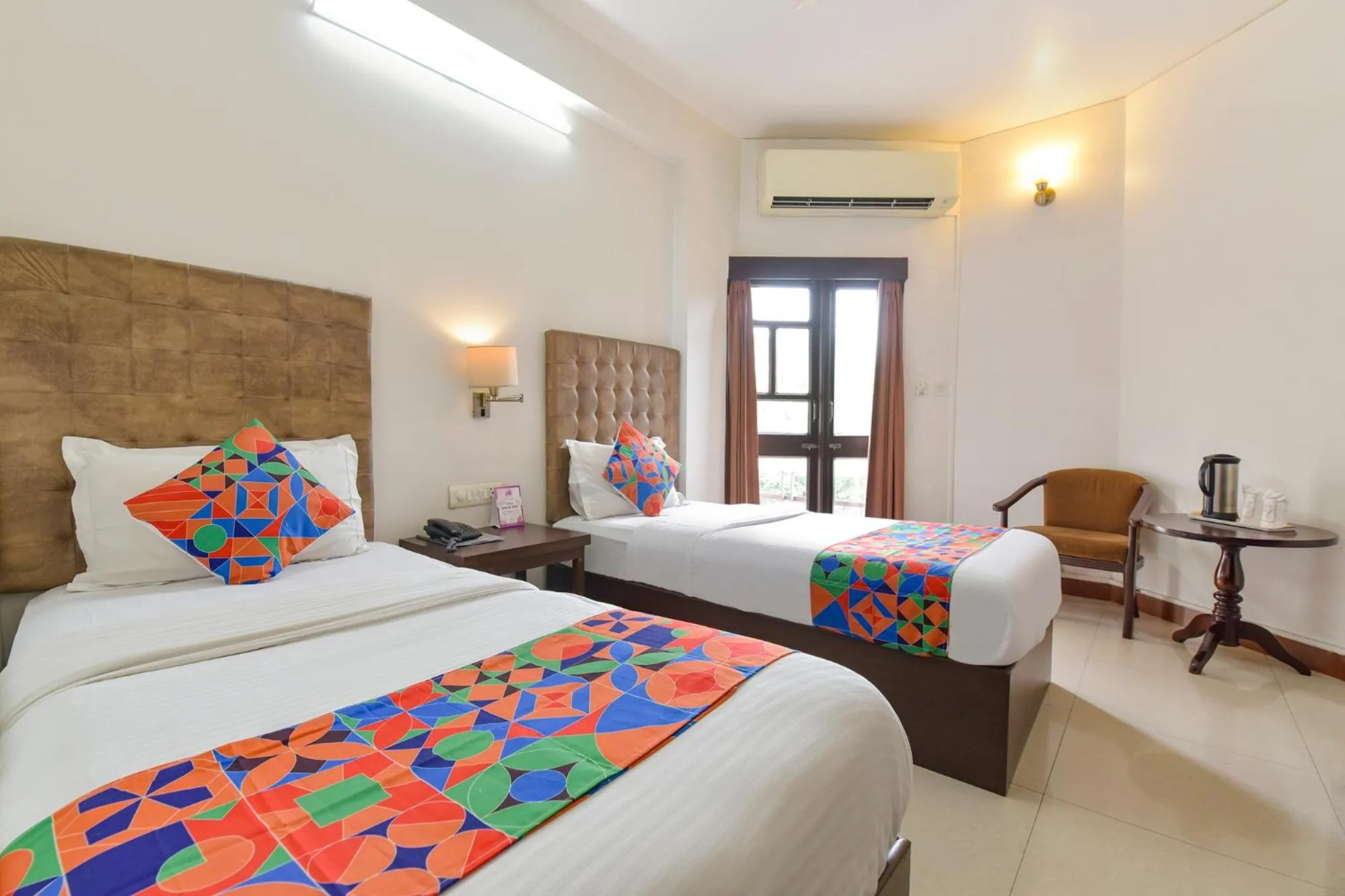 Bed in FabHotel Shikha