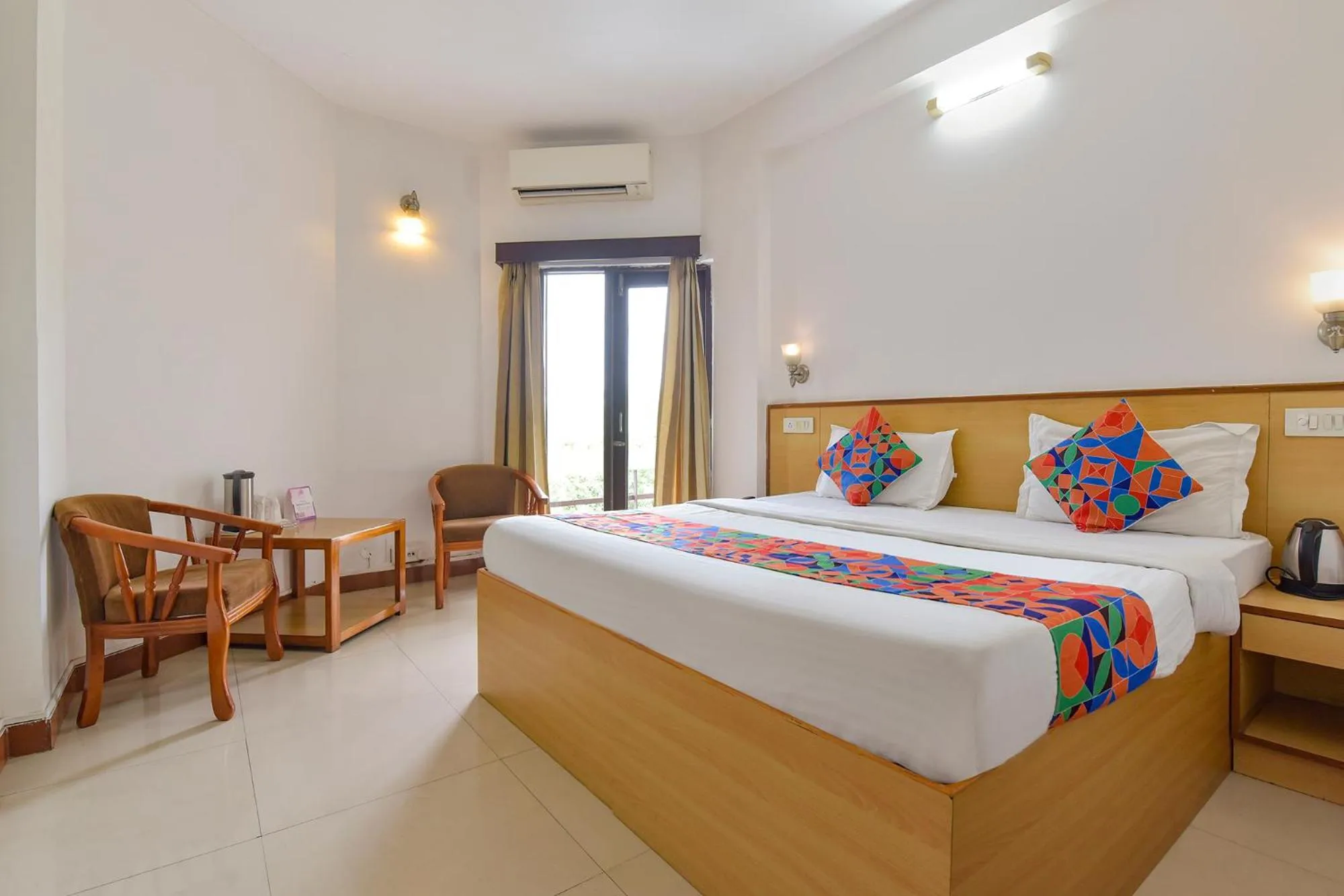 Bed in FabHotel Shikha