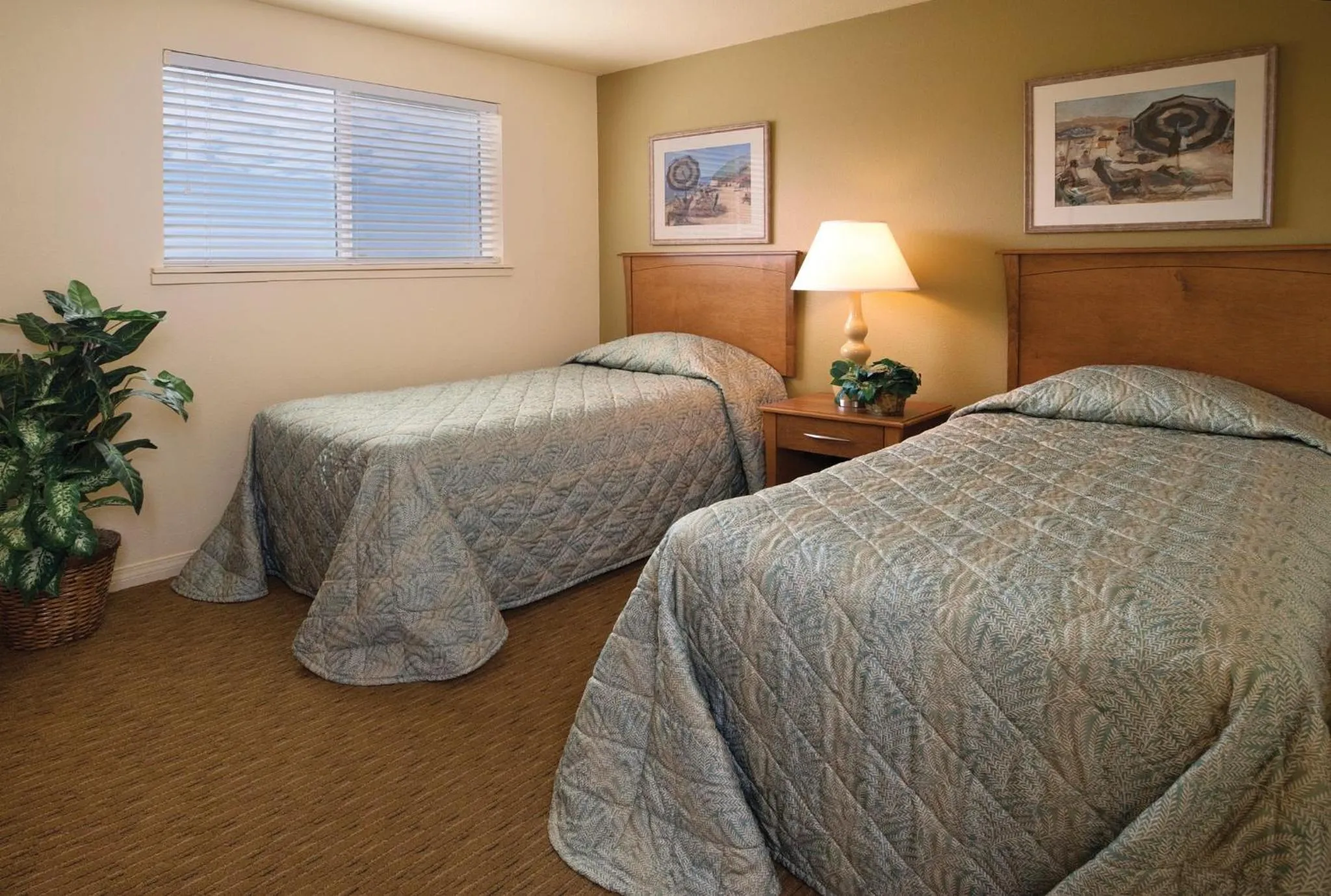 Photo of the whole room, Bed in WorldMark Surfside Inn