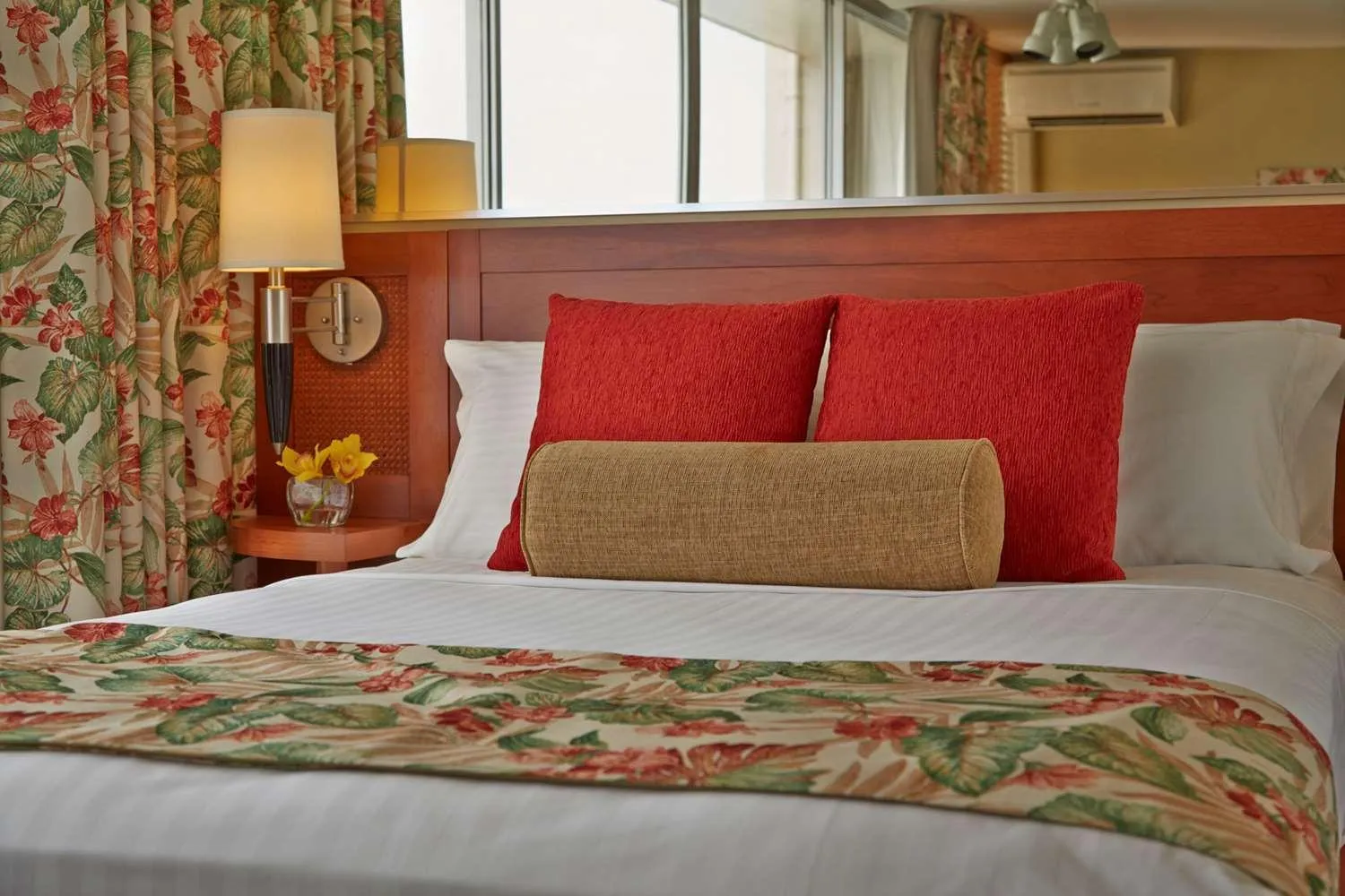 Bed in Pacific Monarch Hotel