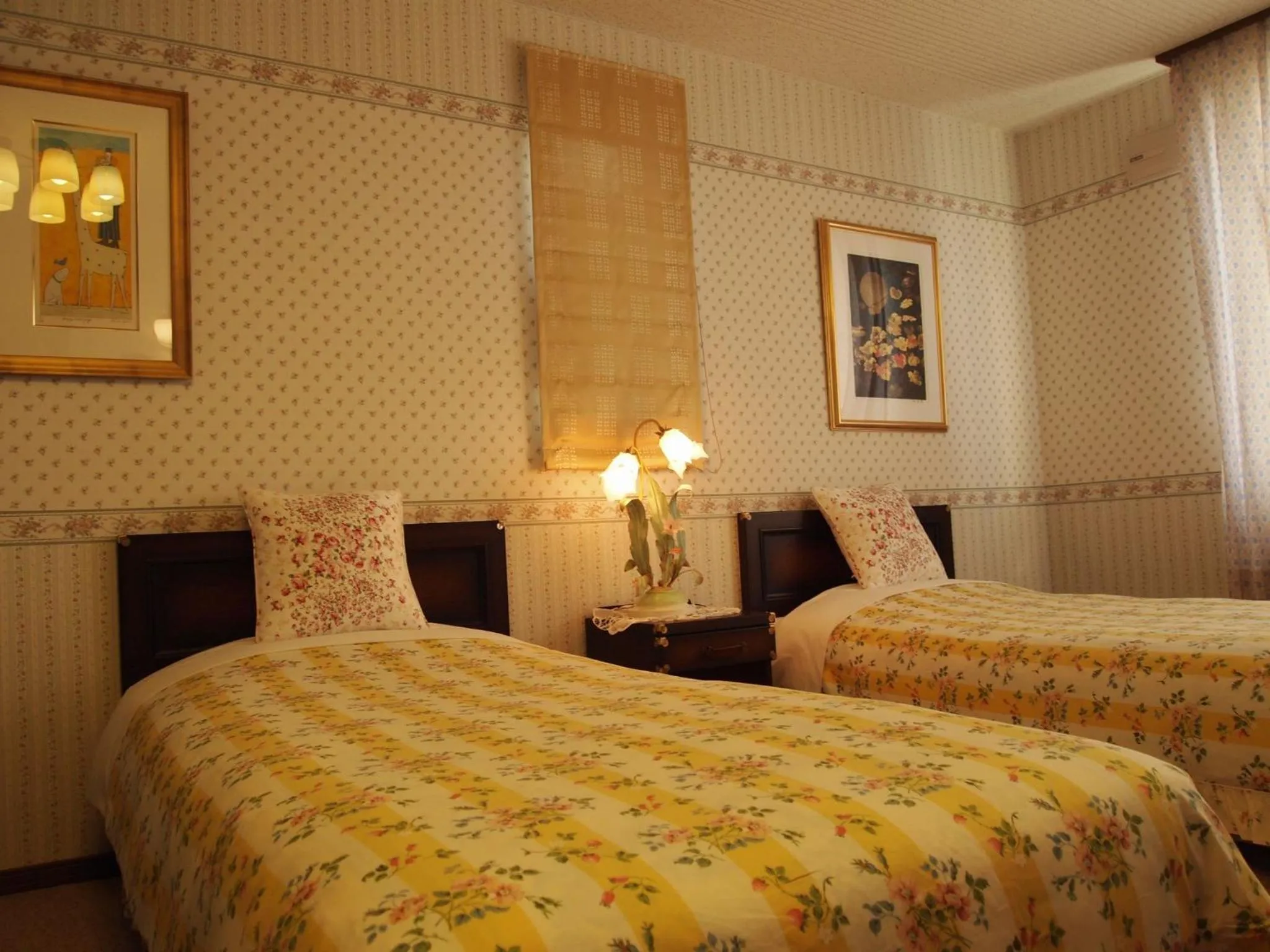 Bed in Petit Hotel Corinthian