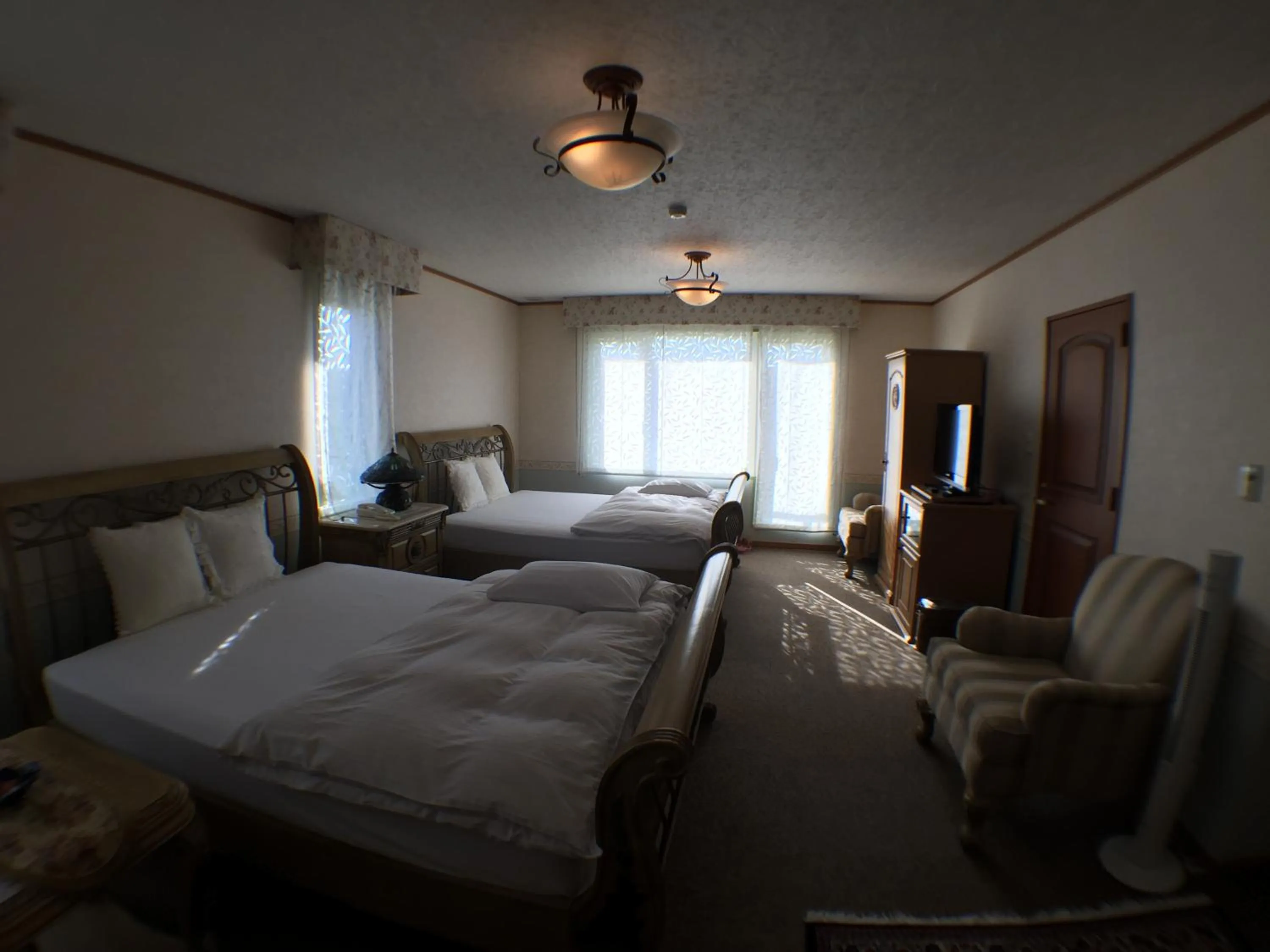 Bedroom in Petit Hotel Corinthian