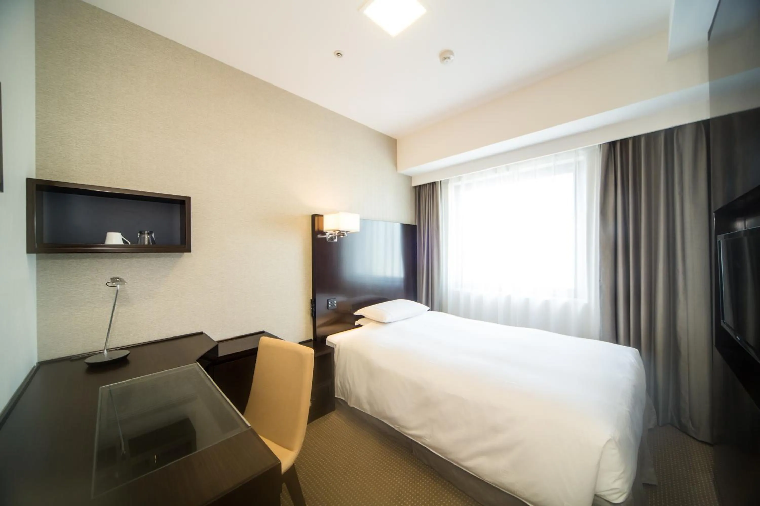 Photo of the whole room, Bed in The Royal Park Canvas Nagoya
