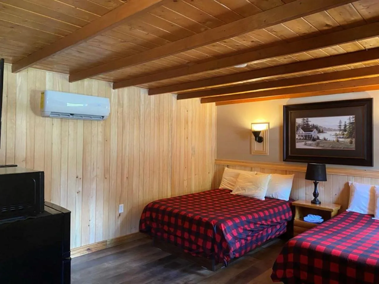 Bed in Auberge MicKy Inc