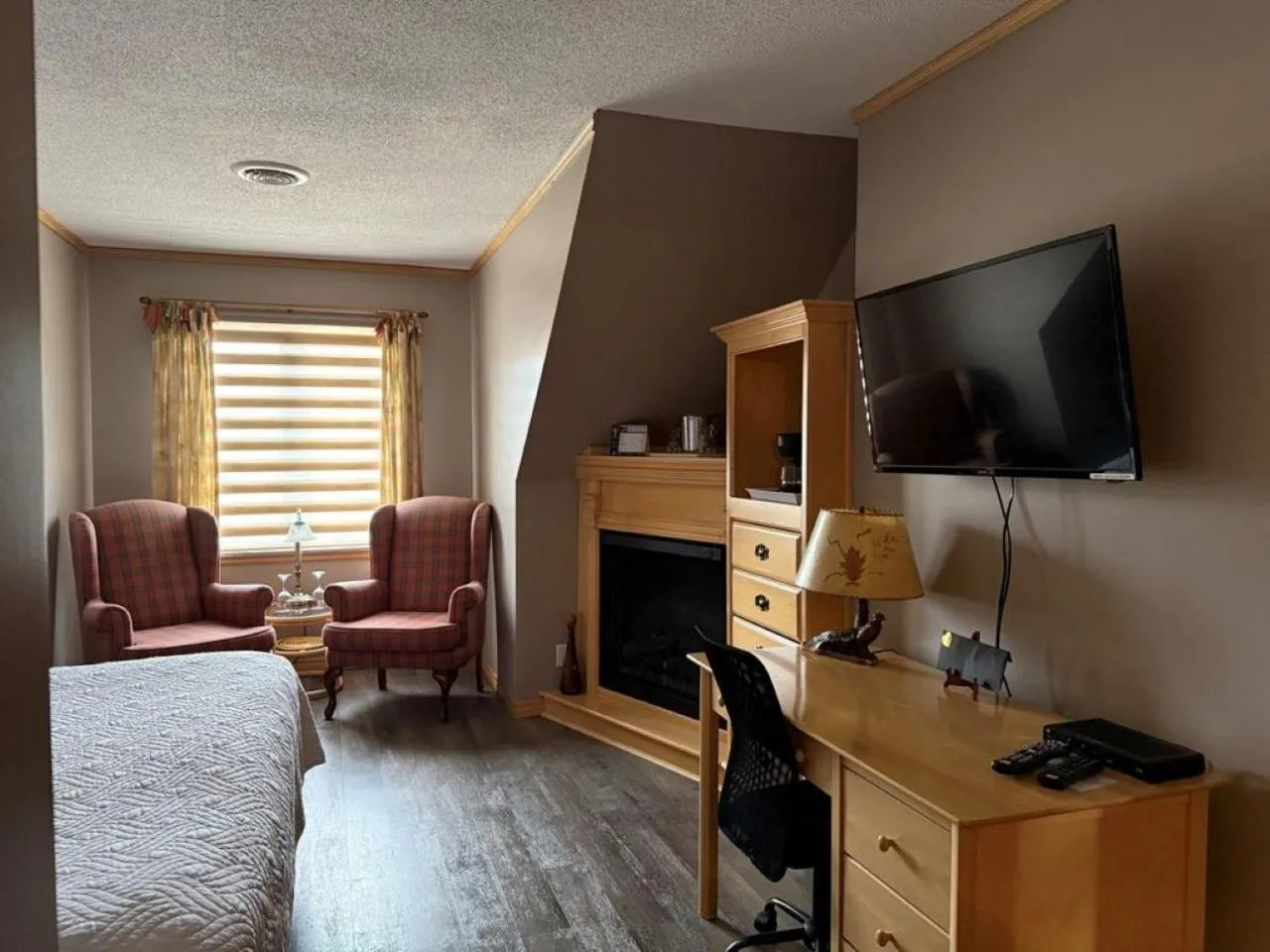 Bed in Auberge MicKy Inc