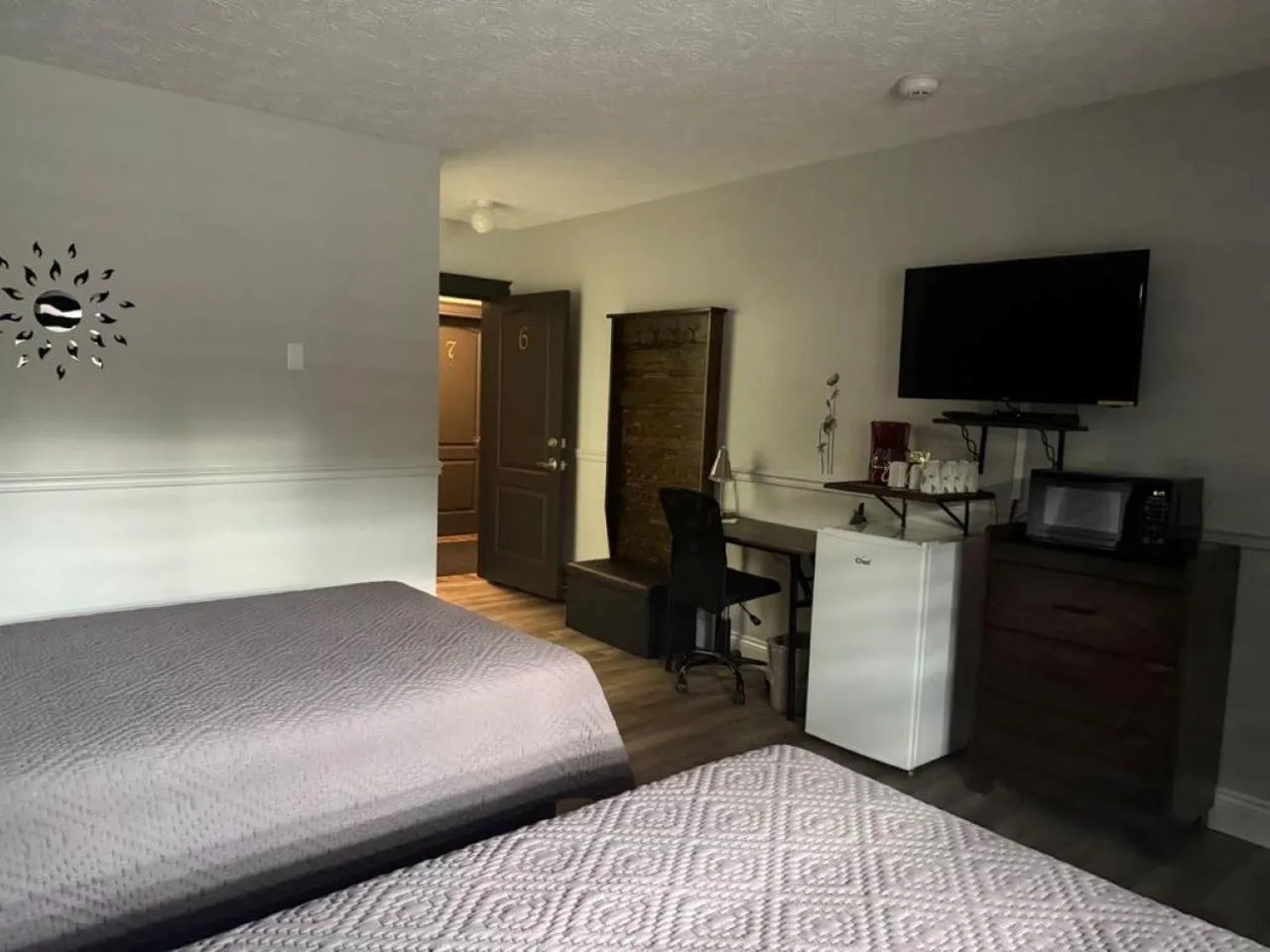 Bed in Auberge MicKy Inc