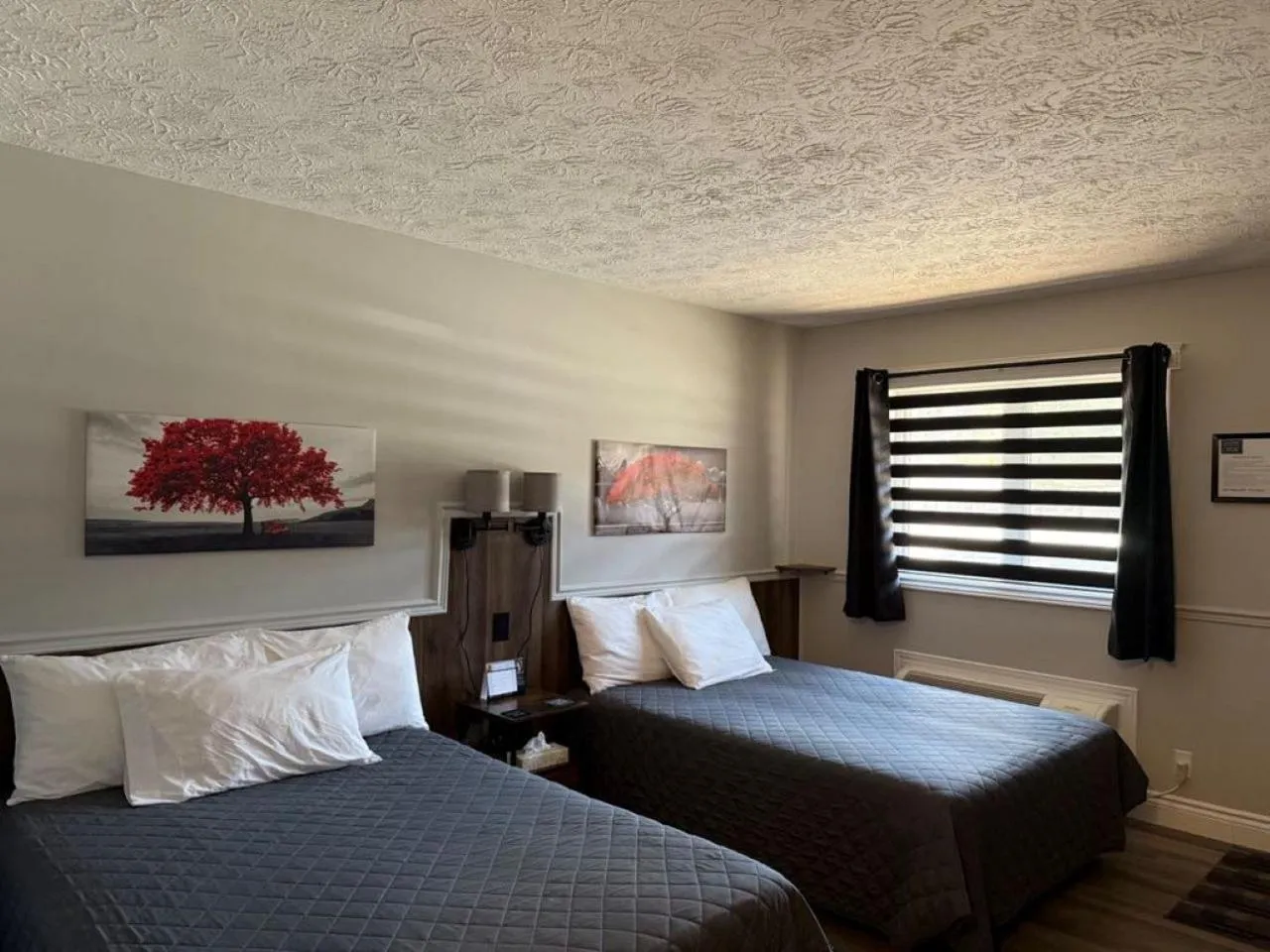 Bed in Auberge MicKy Inc