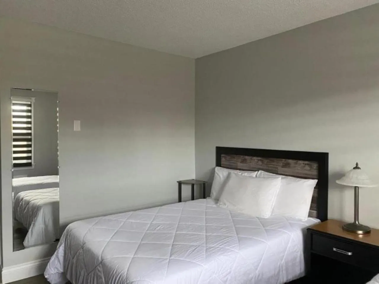 Bed in Auberge MicKy Inc