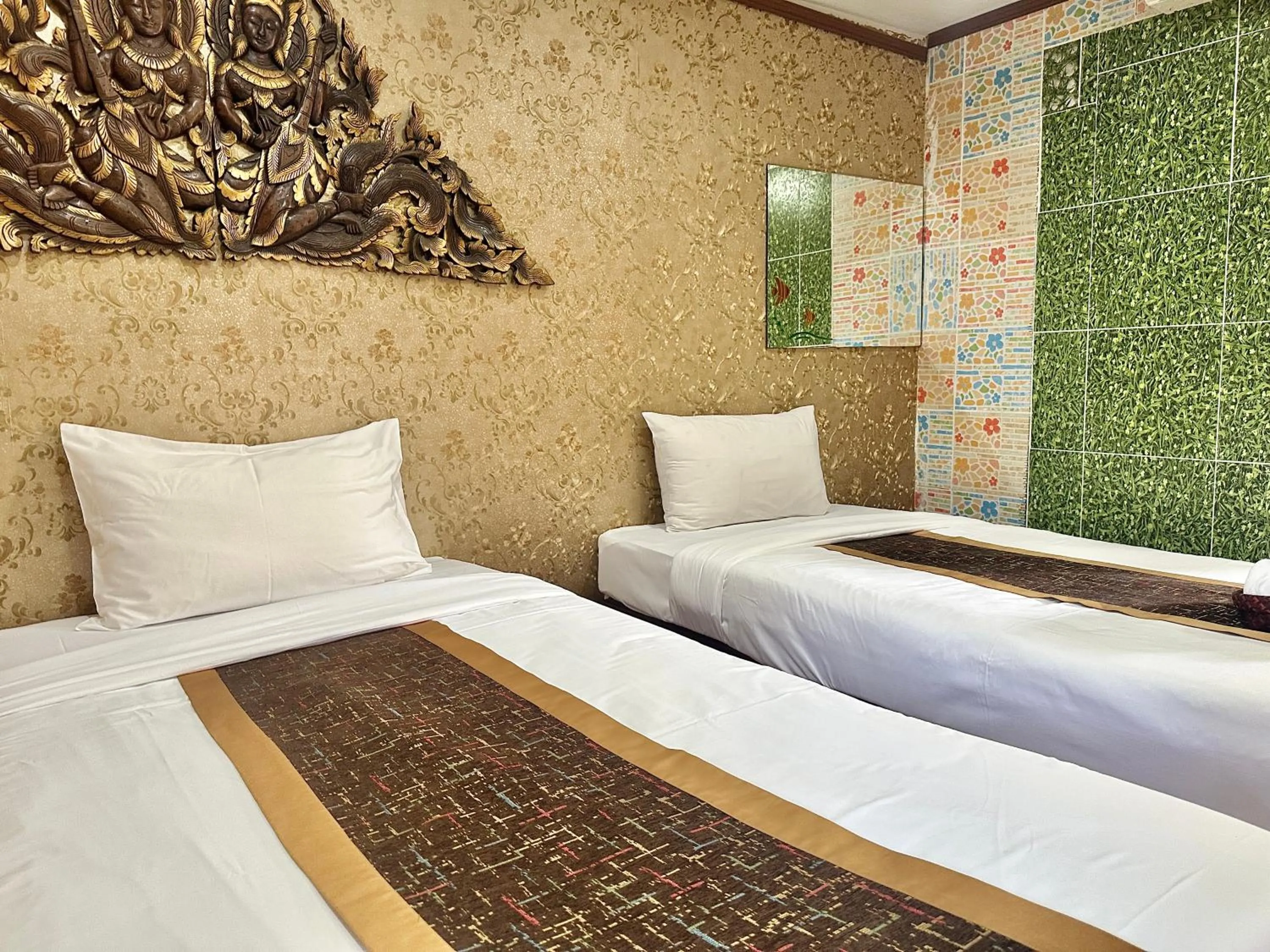 Bed in Montri Resort Donmuang Bangkok