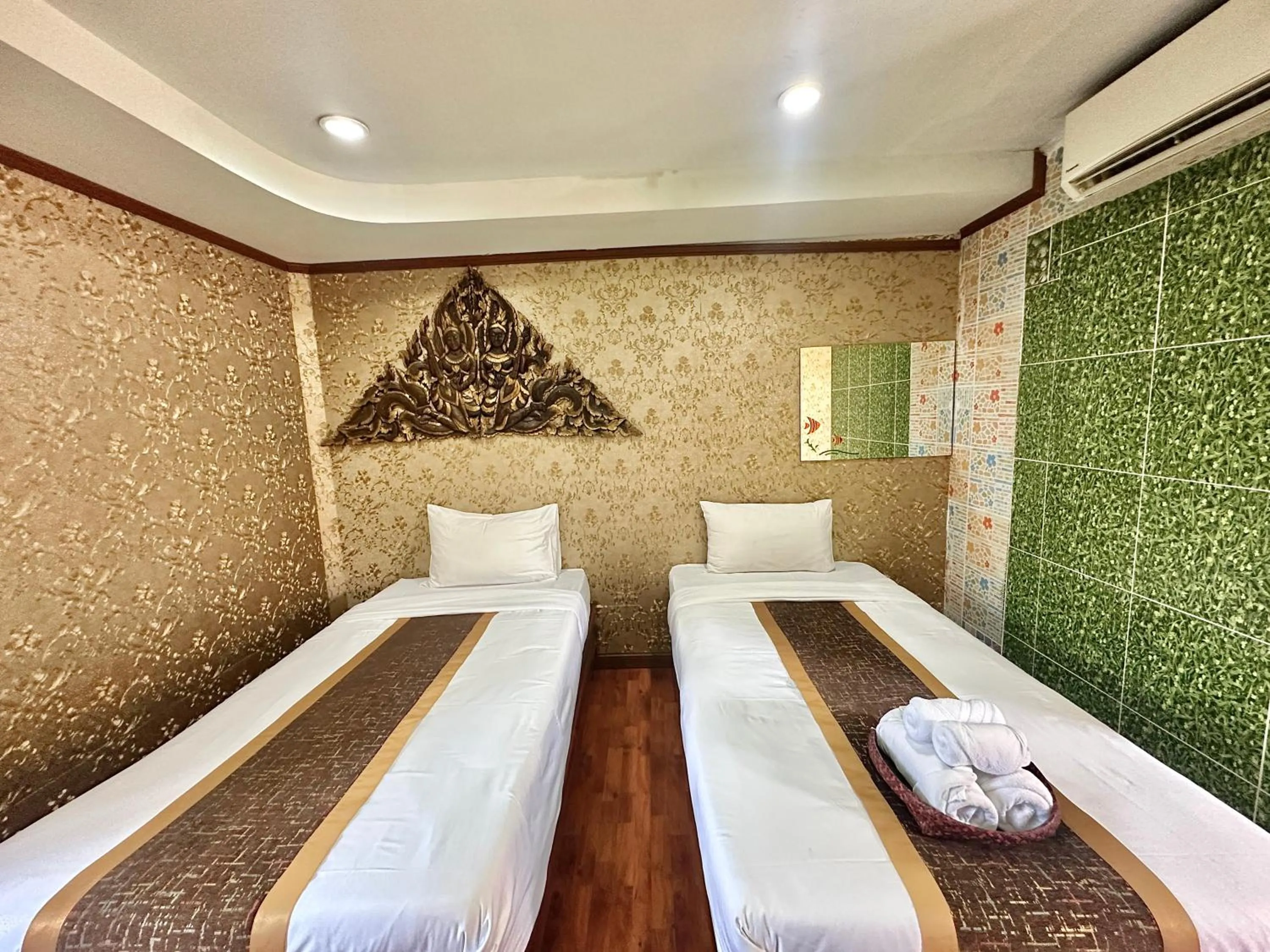 Bed in Montri Resort Donmuang Bangkok