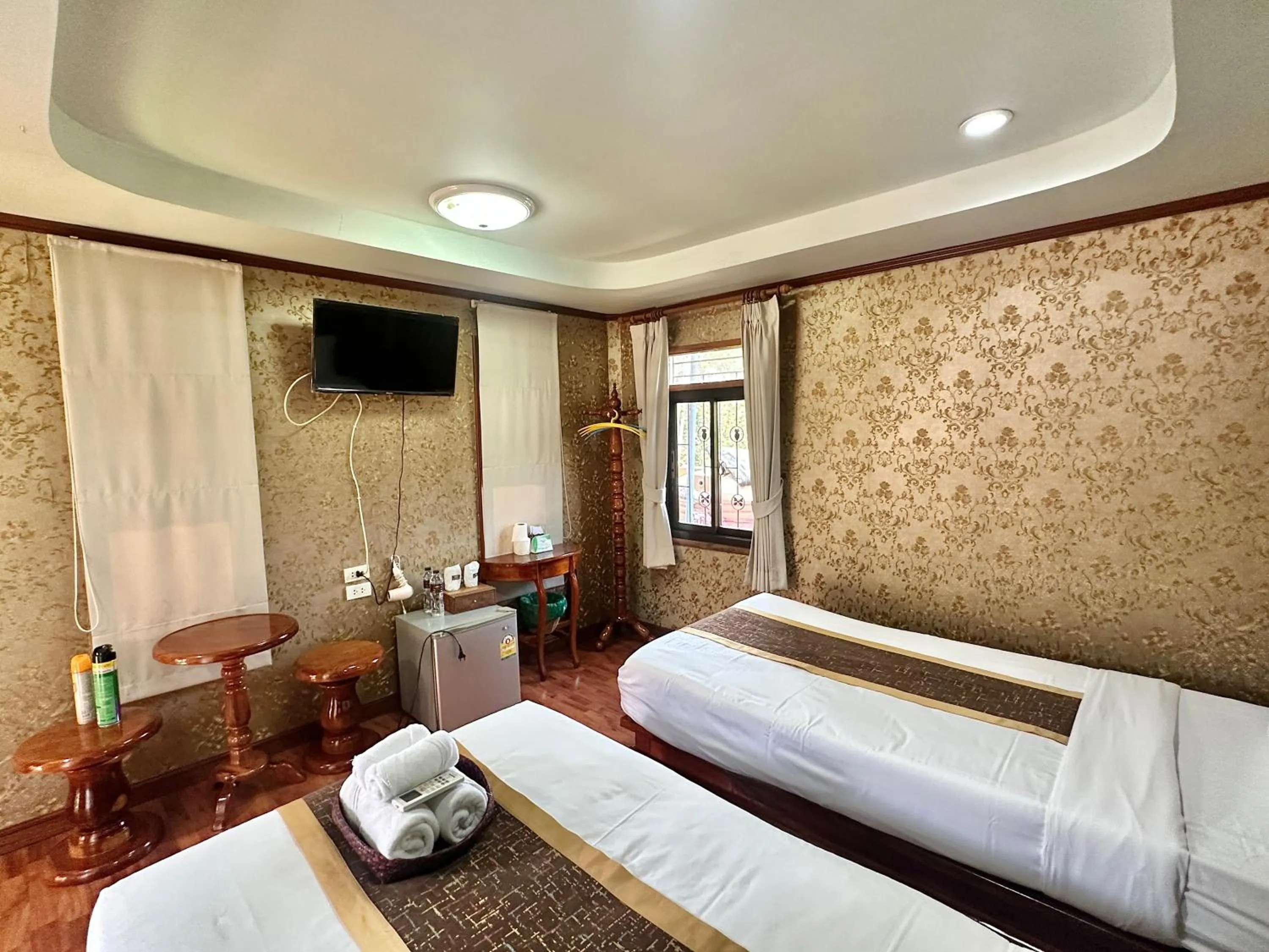 Bed in Montri Resort Donmuang Bangkok