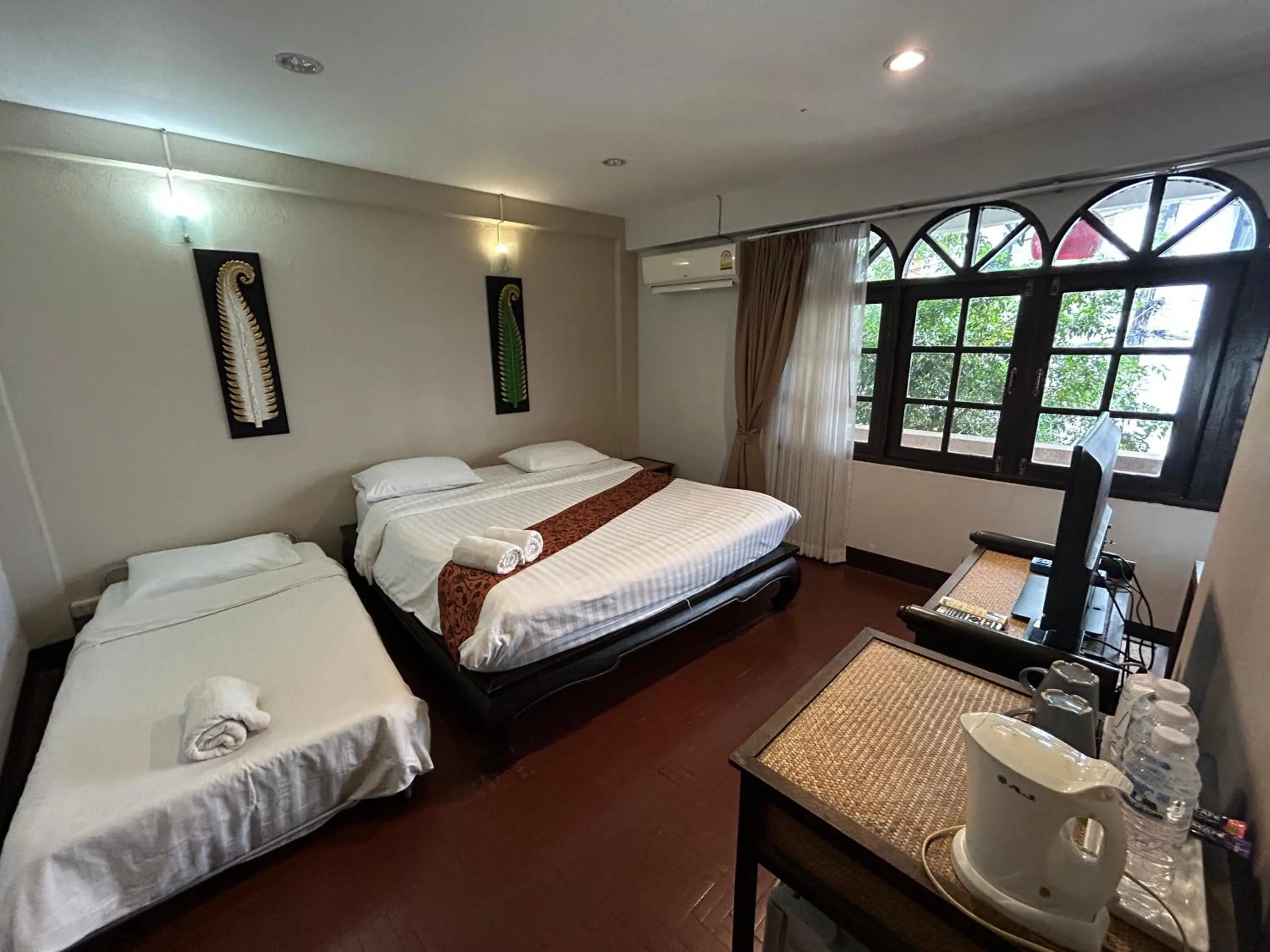 Bed in Kamala's Boutique Guesthouse