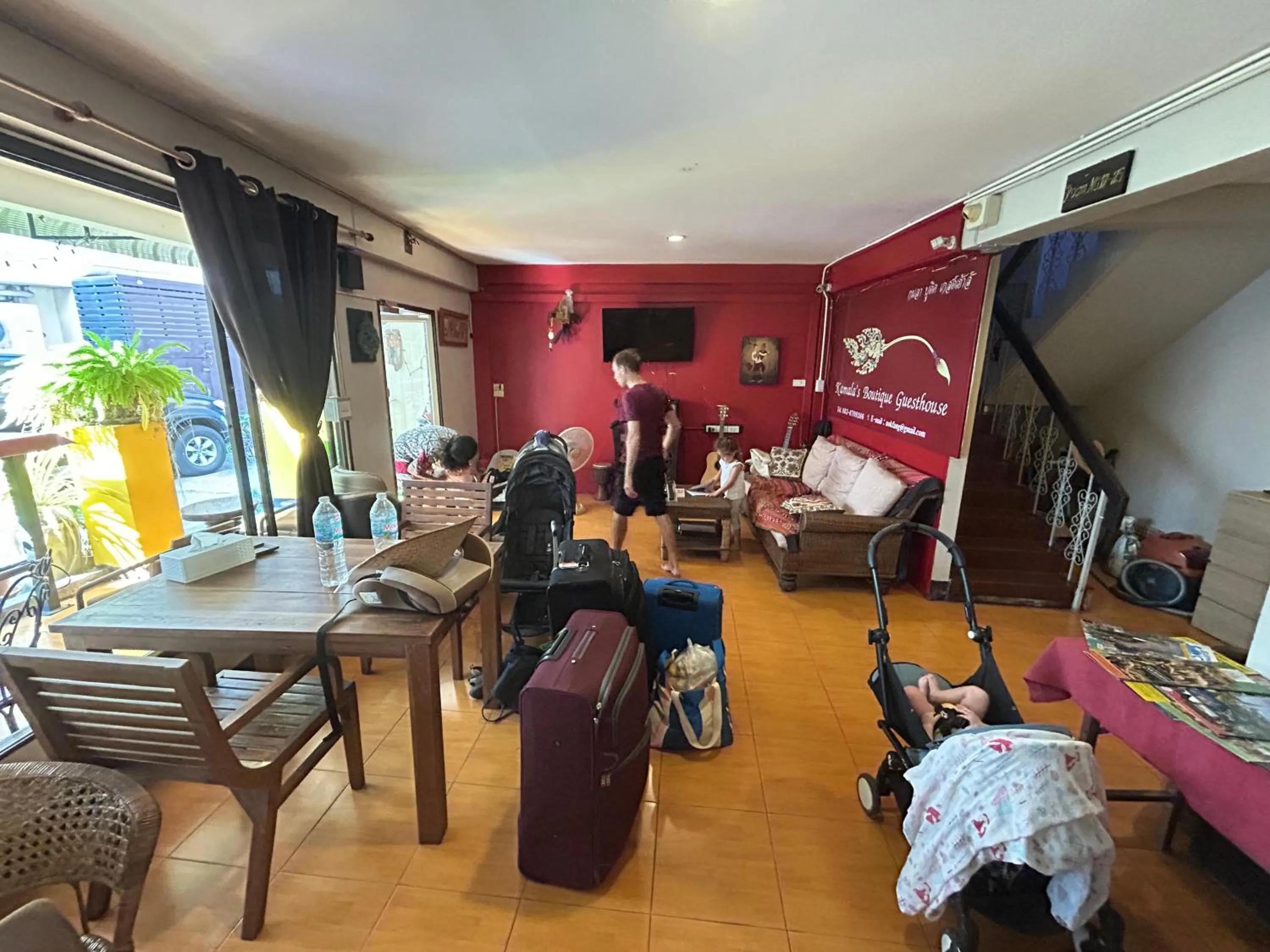 Communal lounge/ TV room in Kamala's Boutique Guesthouse