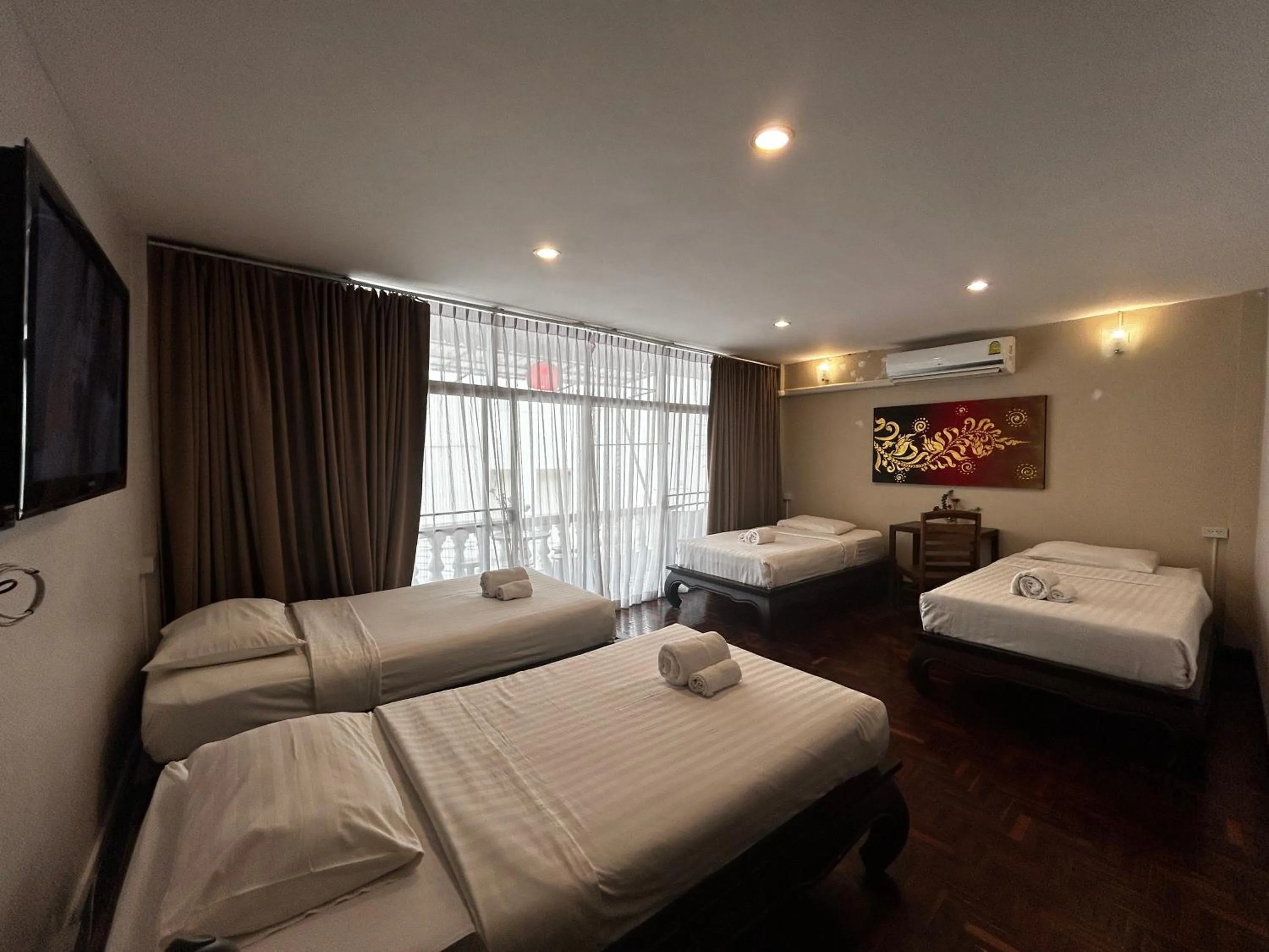 Bed in Kamala's Boutique Guesthouse