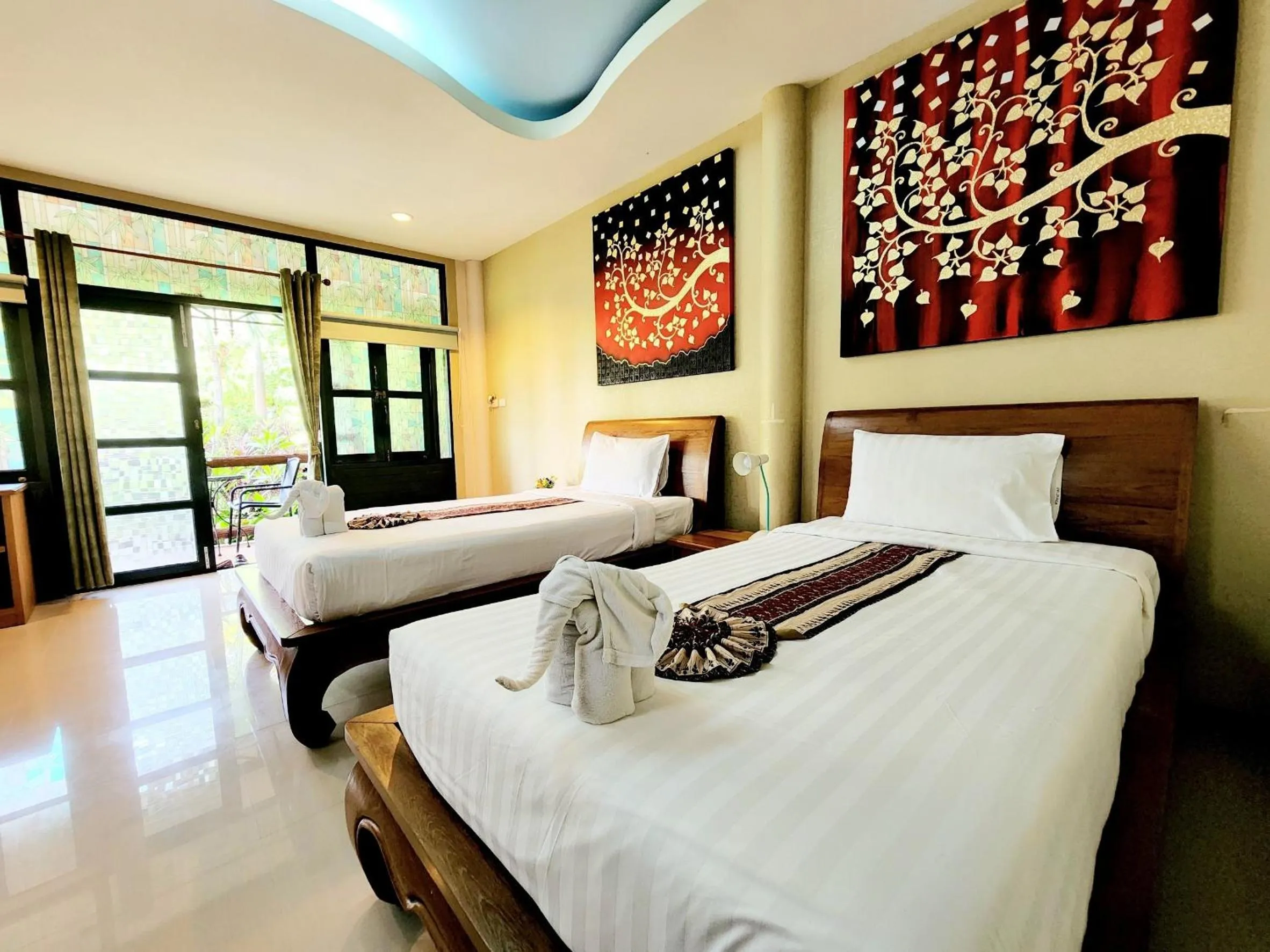 Bed in Kata Garden Resort SHA Extra Plus